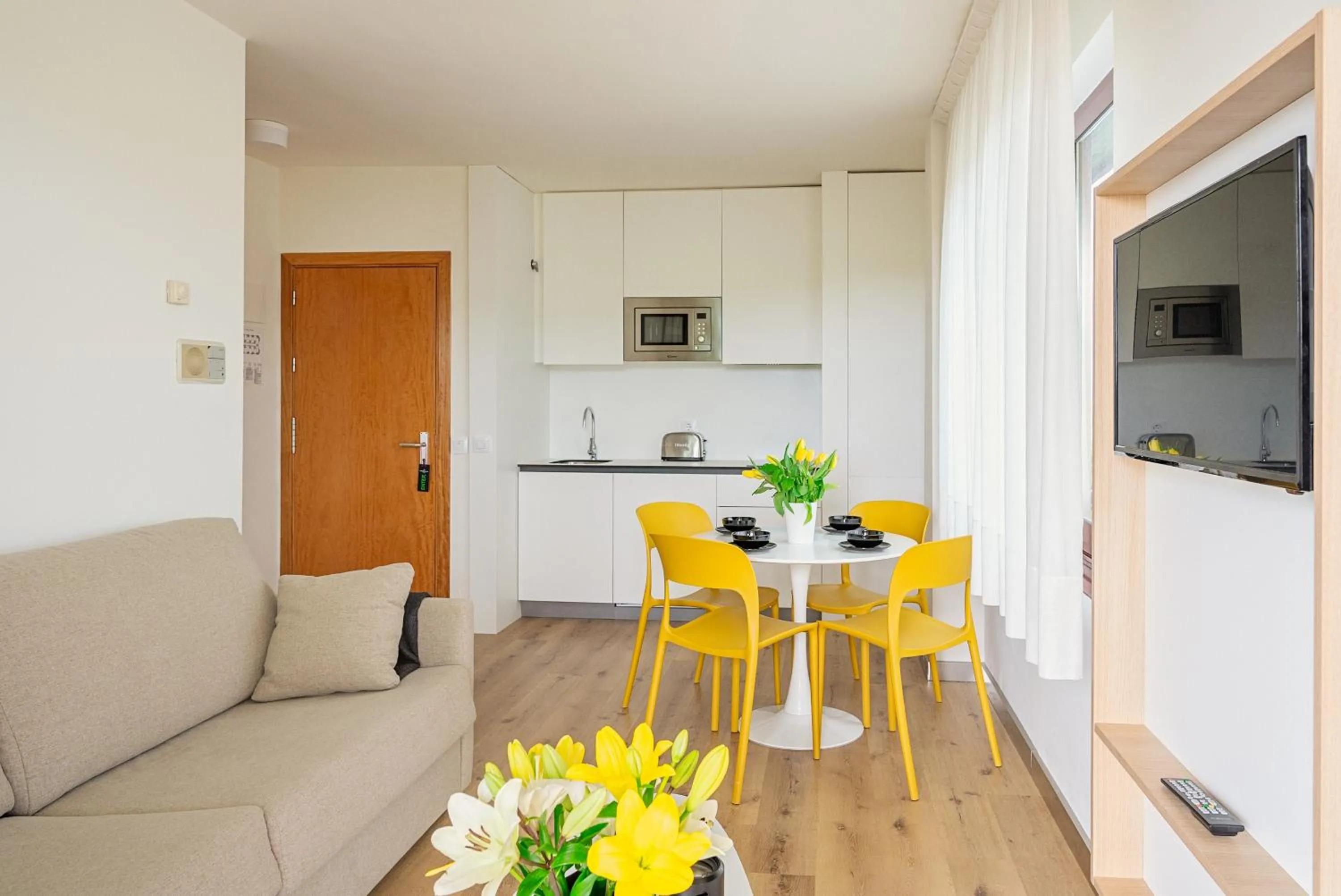 Kitchen or kitchenette in Playas de Liencres - Hotel & Apartamentos