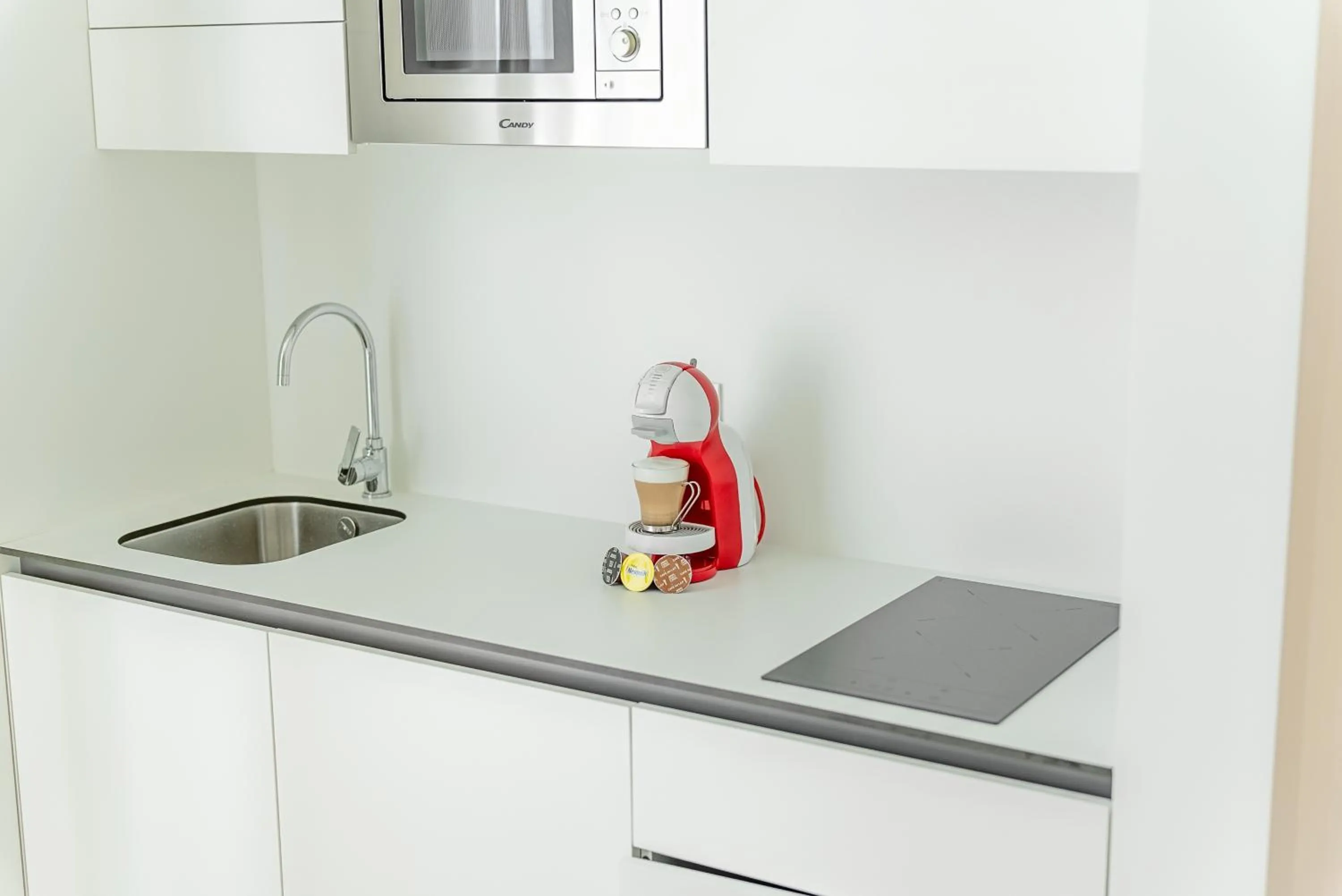 Kitchen or kitchenette in Playas de Liencres - Hotel & Apartamentos