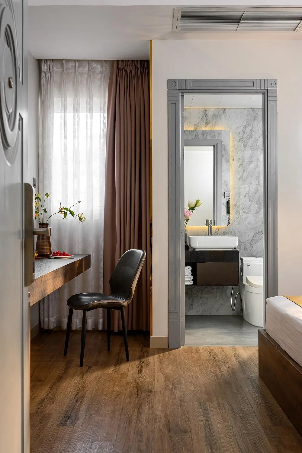 Seating area, Bed in Acnos Hotel