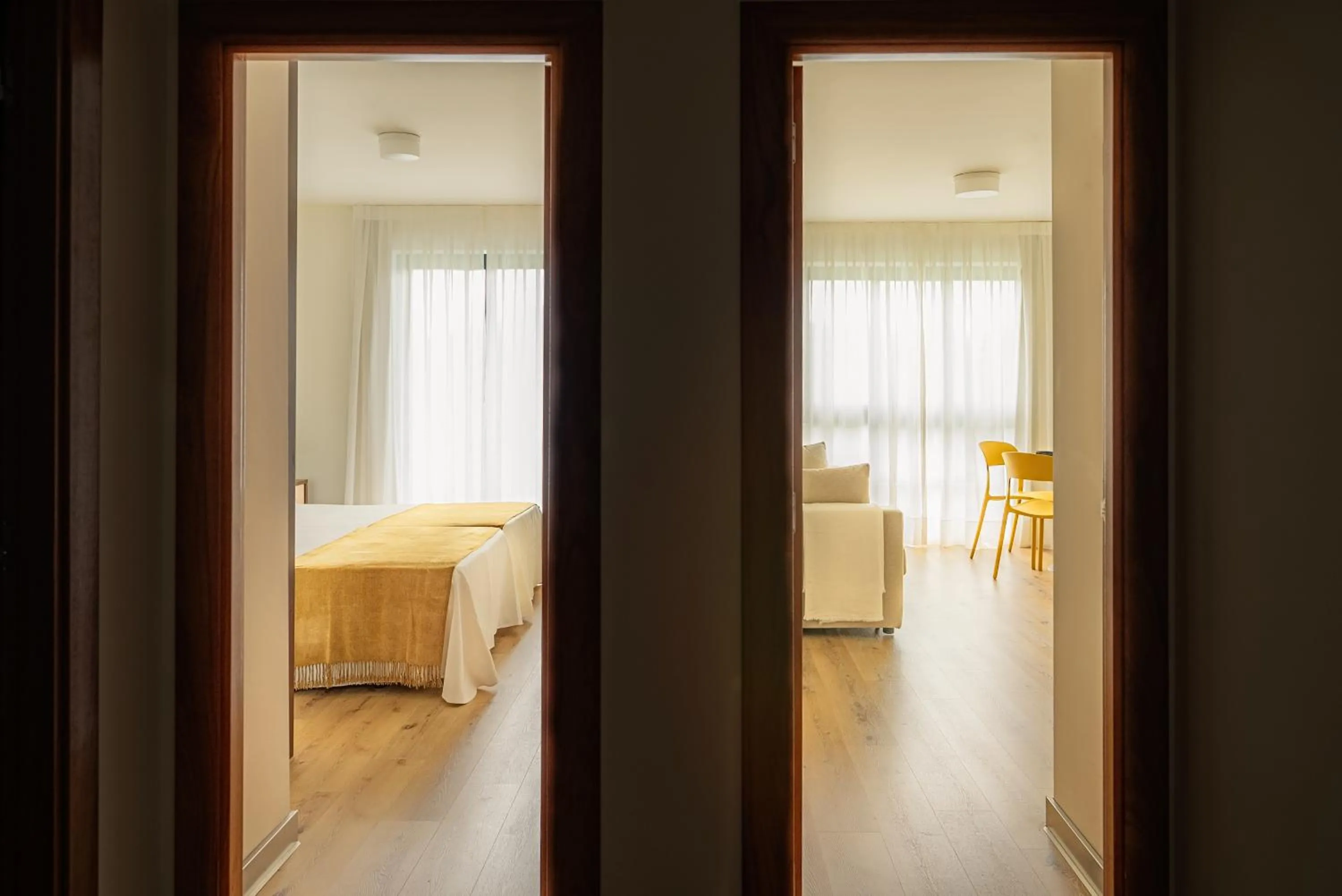 Living room, Bed in Apartamentos Dunas de Liencres