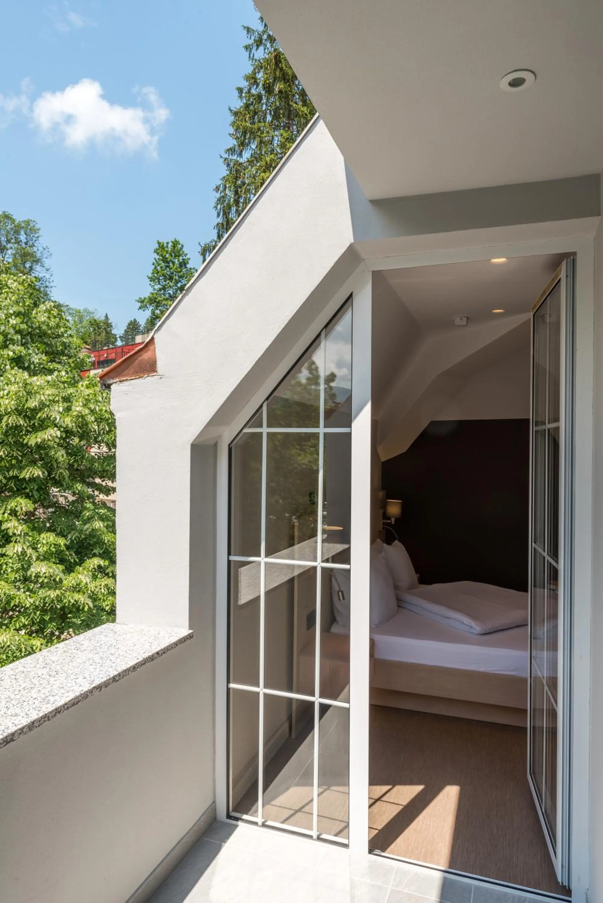 Bed in Emilia Lux Rooms