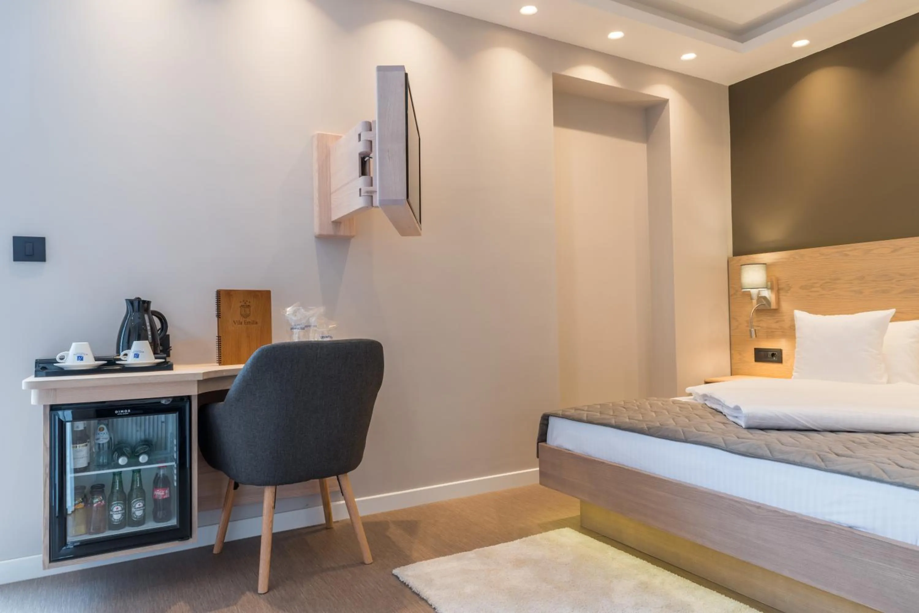 Bed in Emilia Lux Rooms