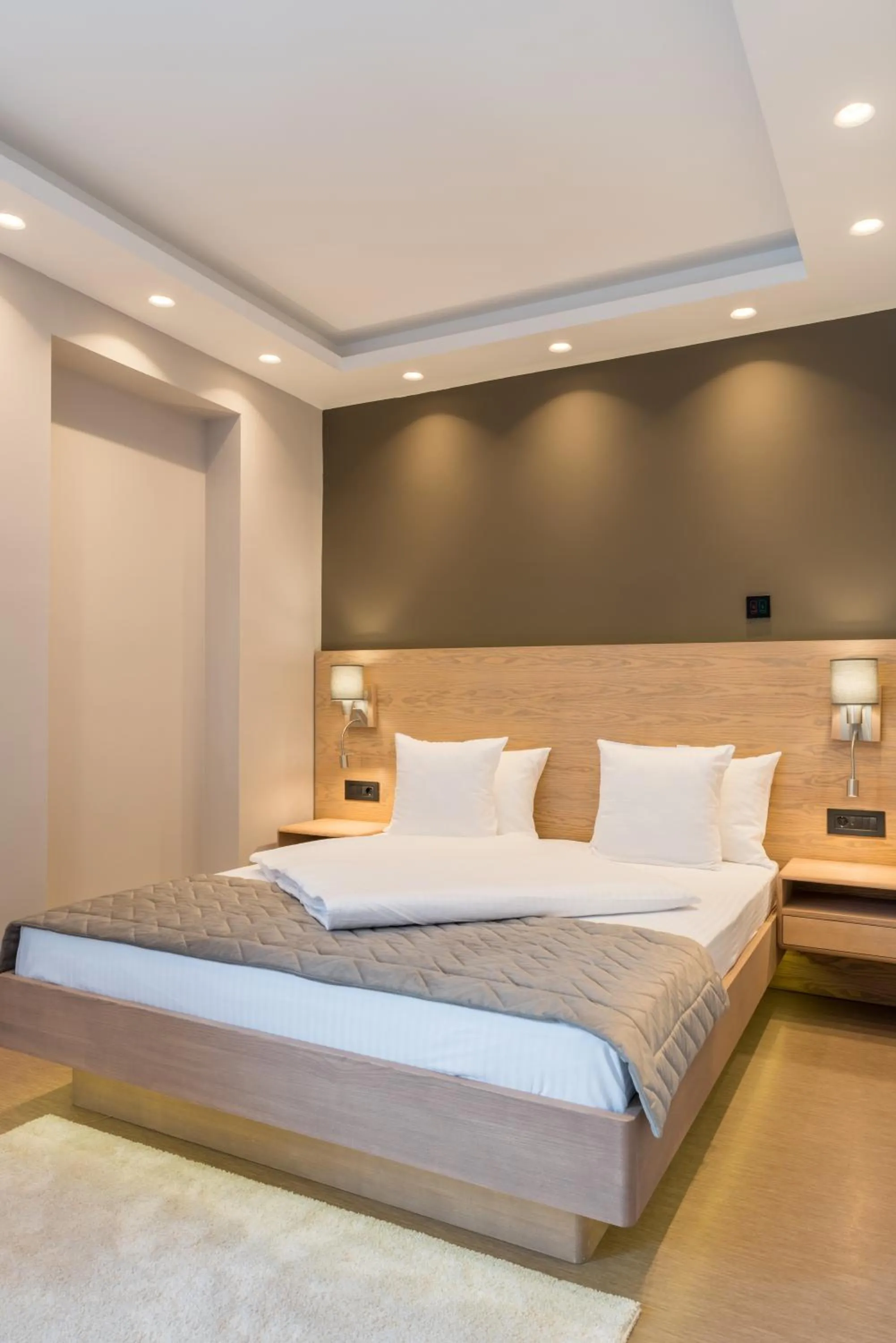 Bed in Emilia Lux Rooms