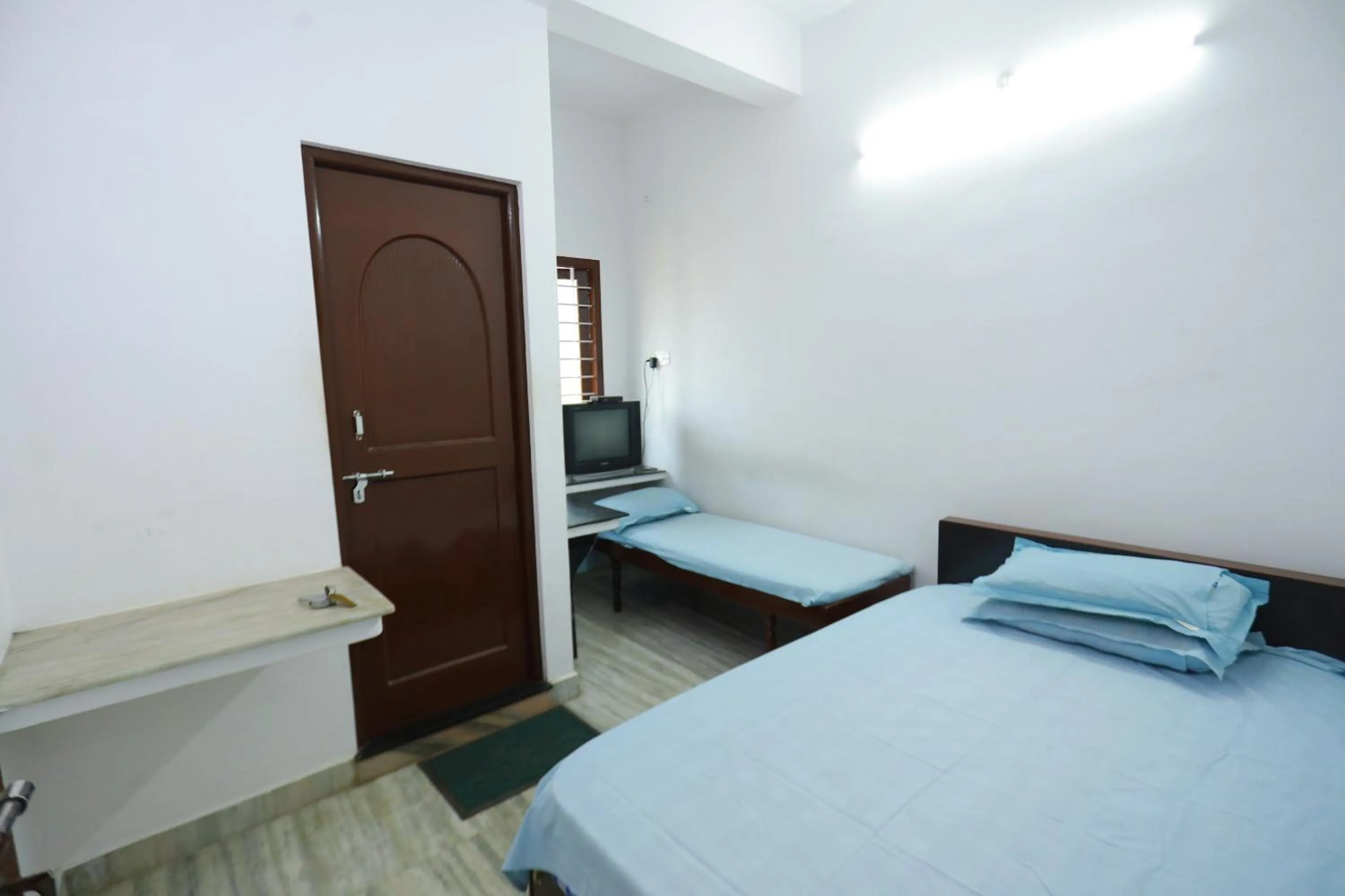 Bed in Arackal Tourist Home