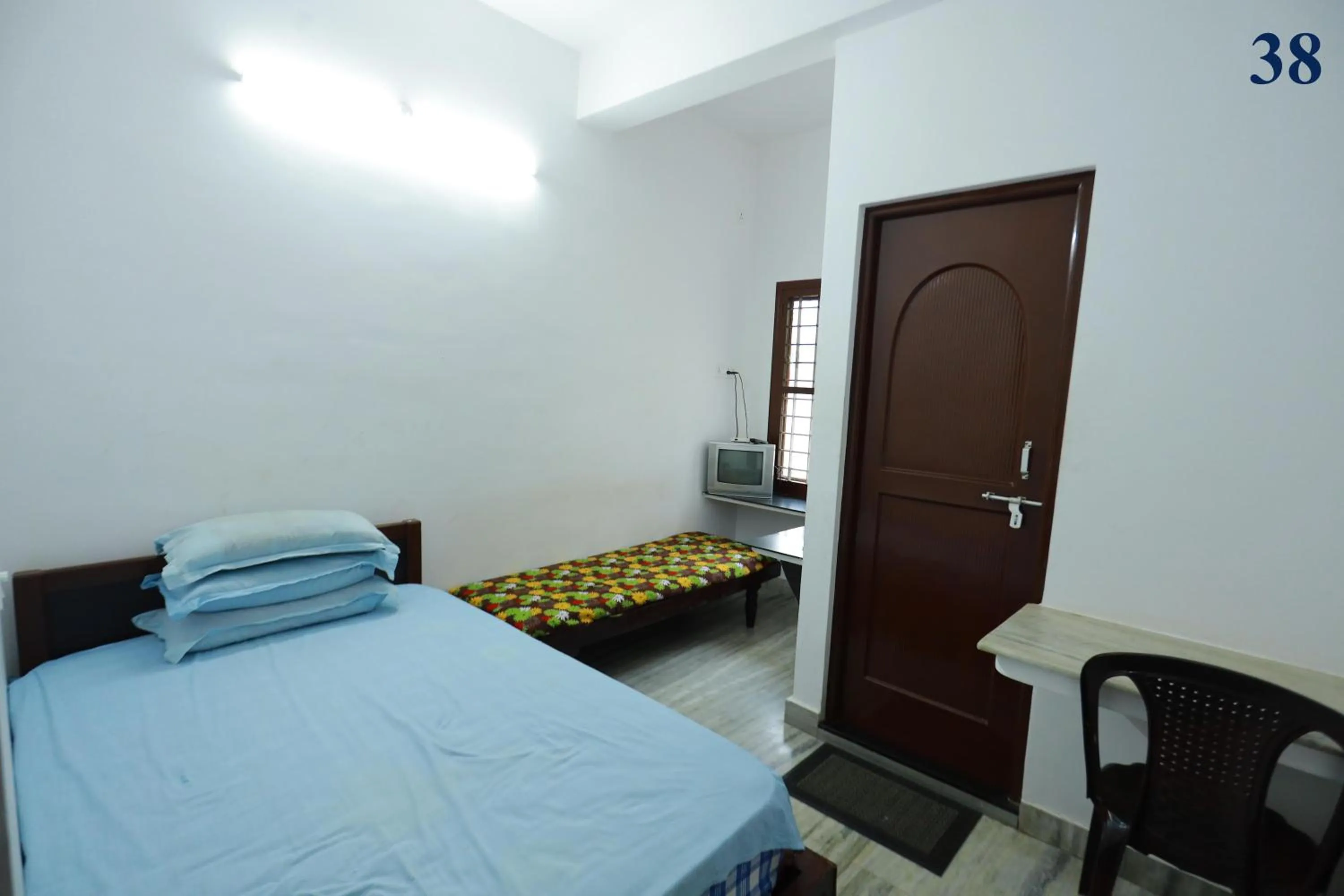 Bed in Arackal Tourist Home