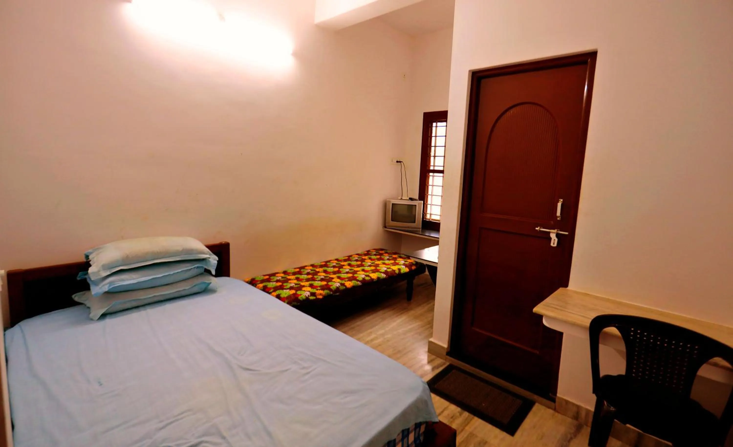 Bed in Arackal Tourist Home