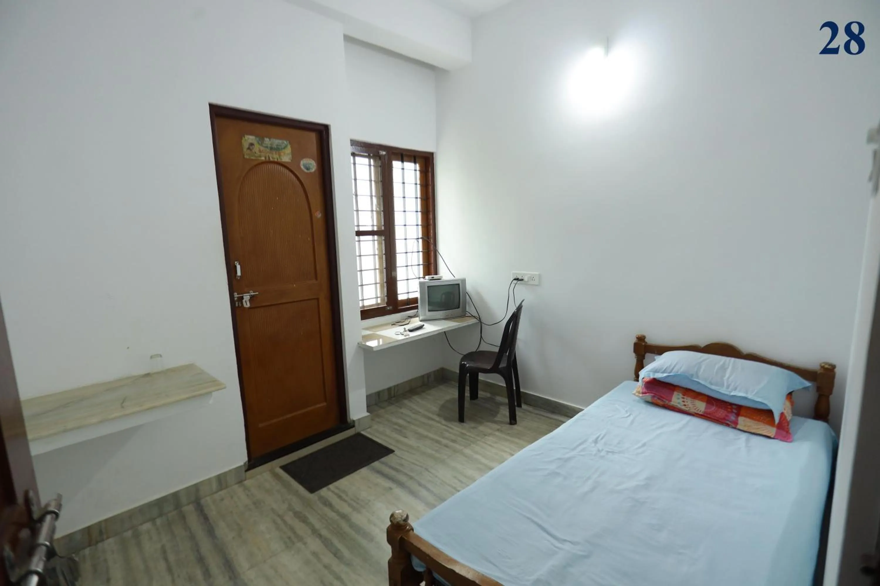 Bed in Arackal Tourist Home