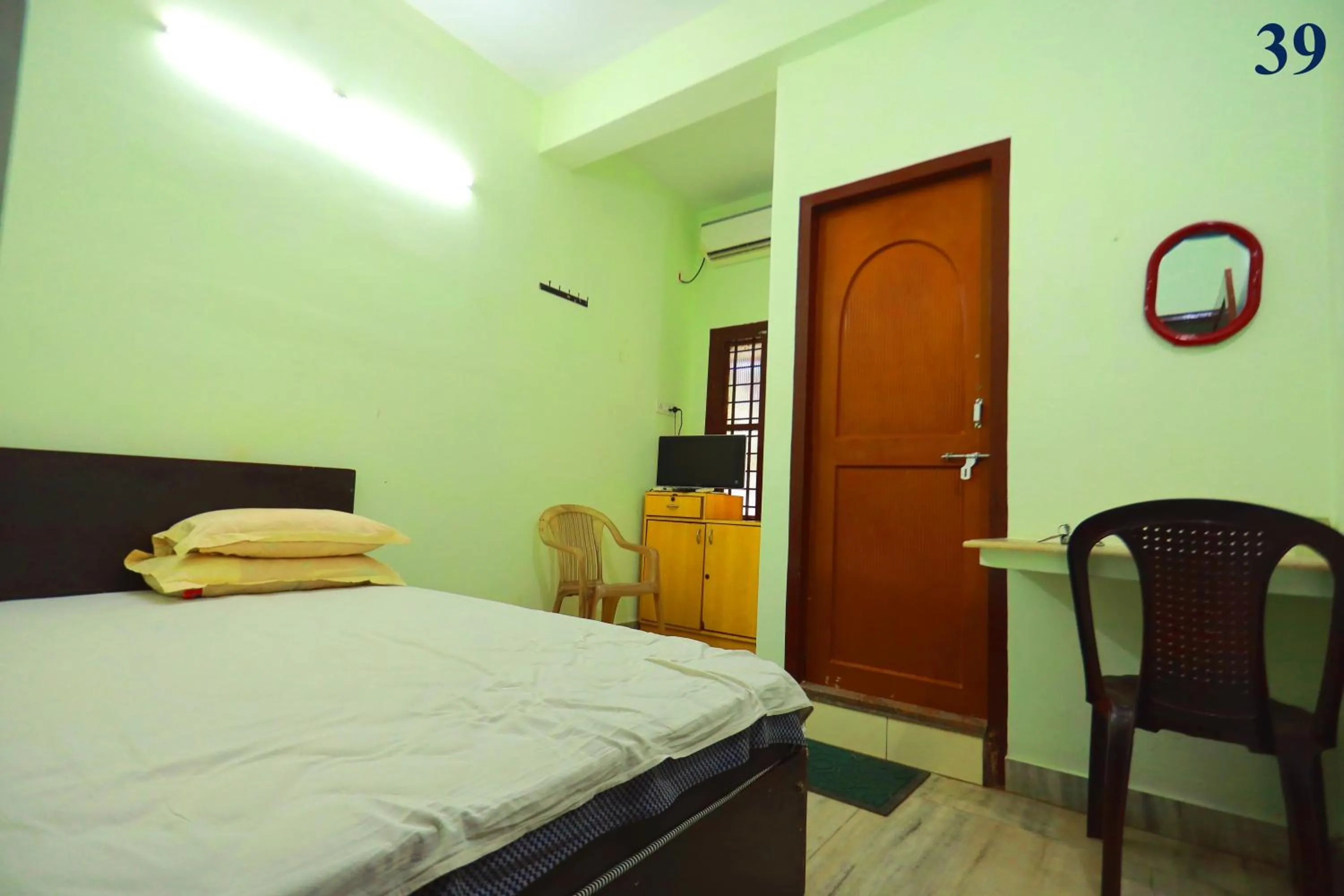 Bed in Arackal Tourist Home