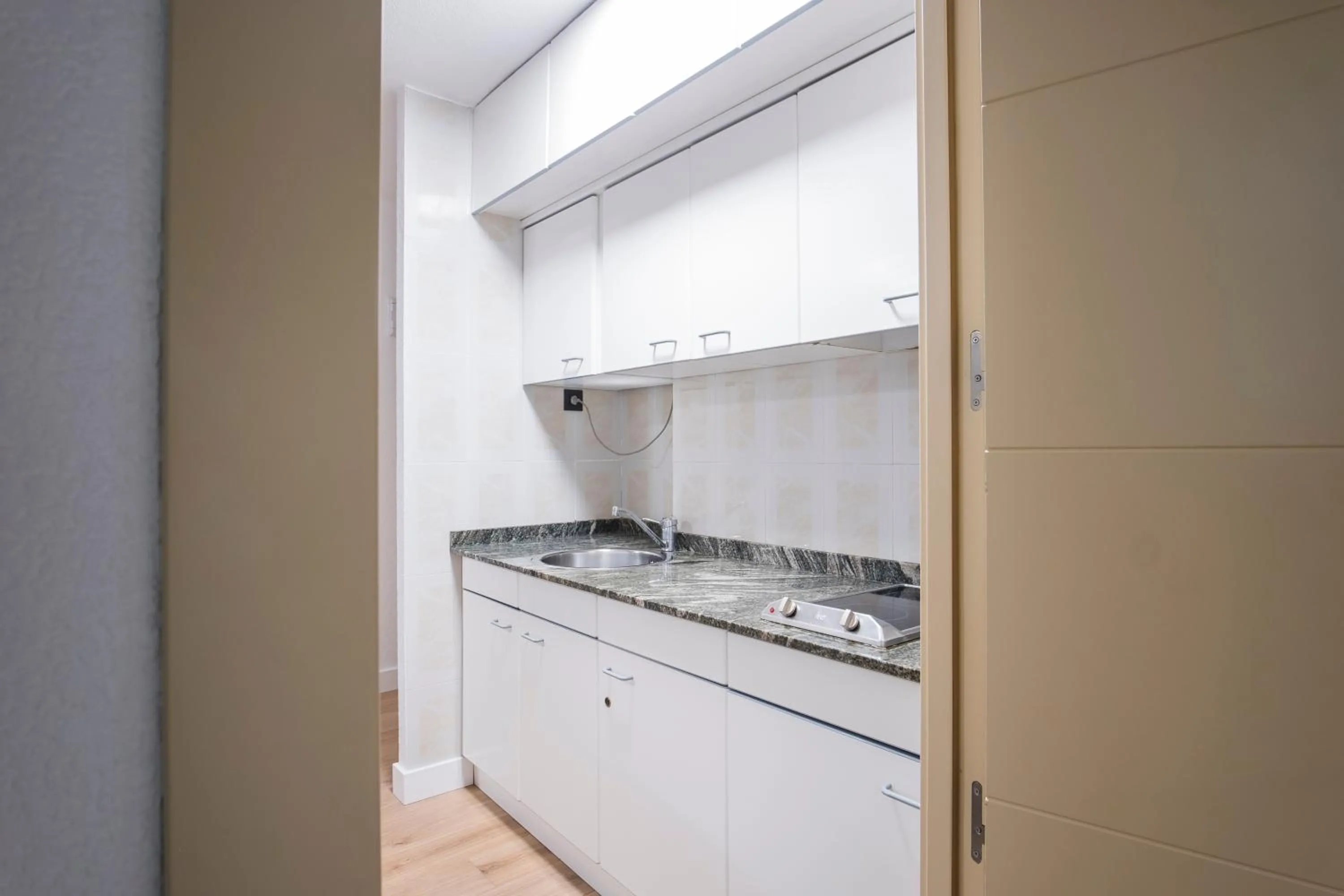 Kitchen or kitchenette in Alda Don Carlos