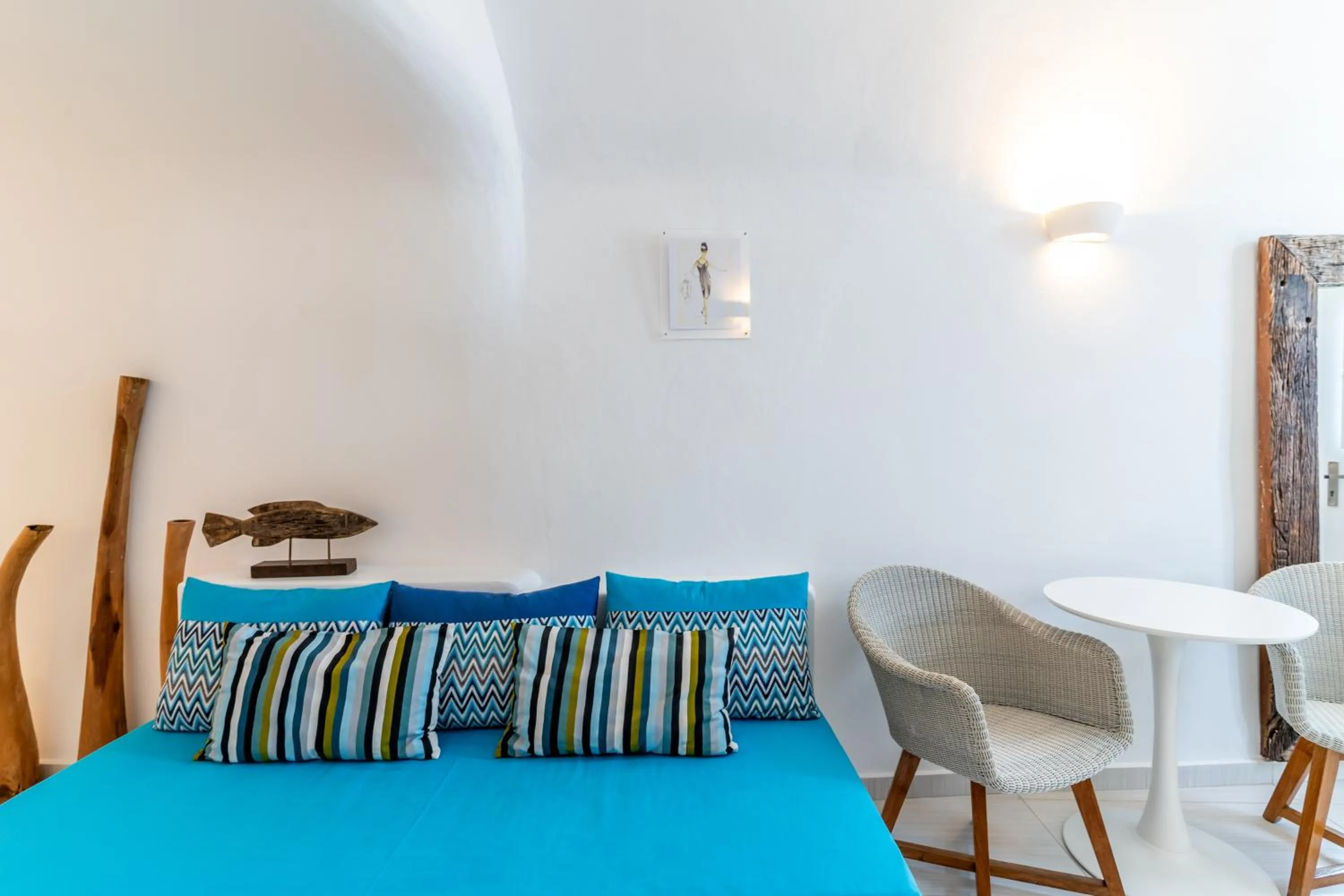 Living room, Bed in Vogue Suites