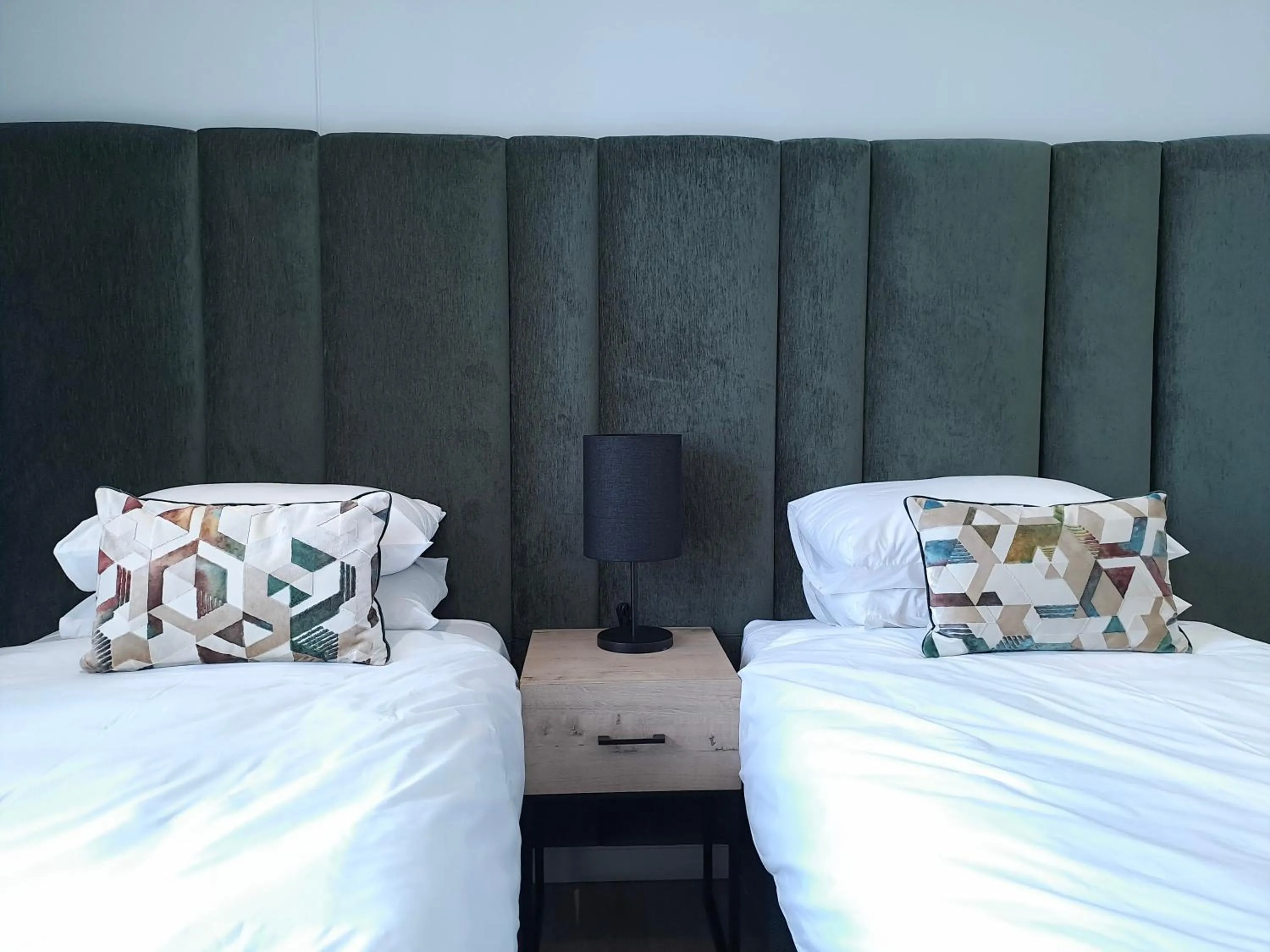 Bed in Executive Apartment at Ellipse Waterfall