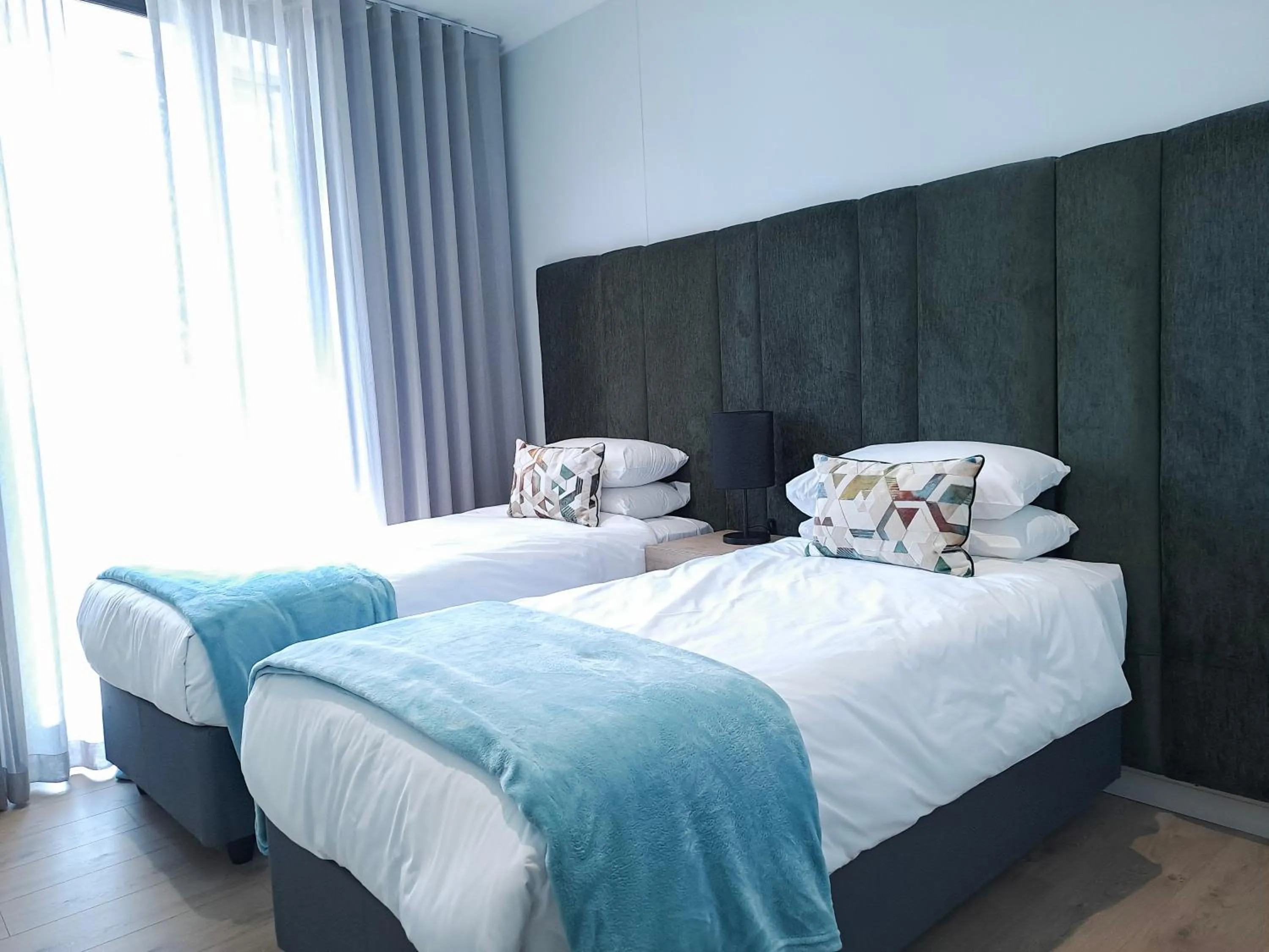 Bed in Executive Apartment at Ellipse Waterfall