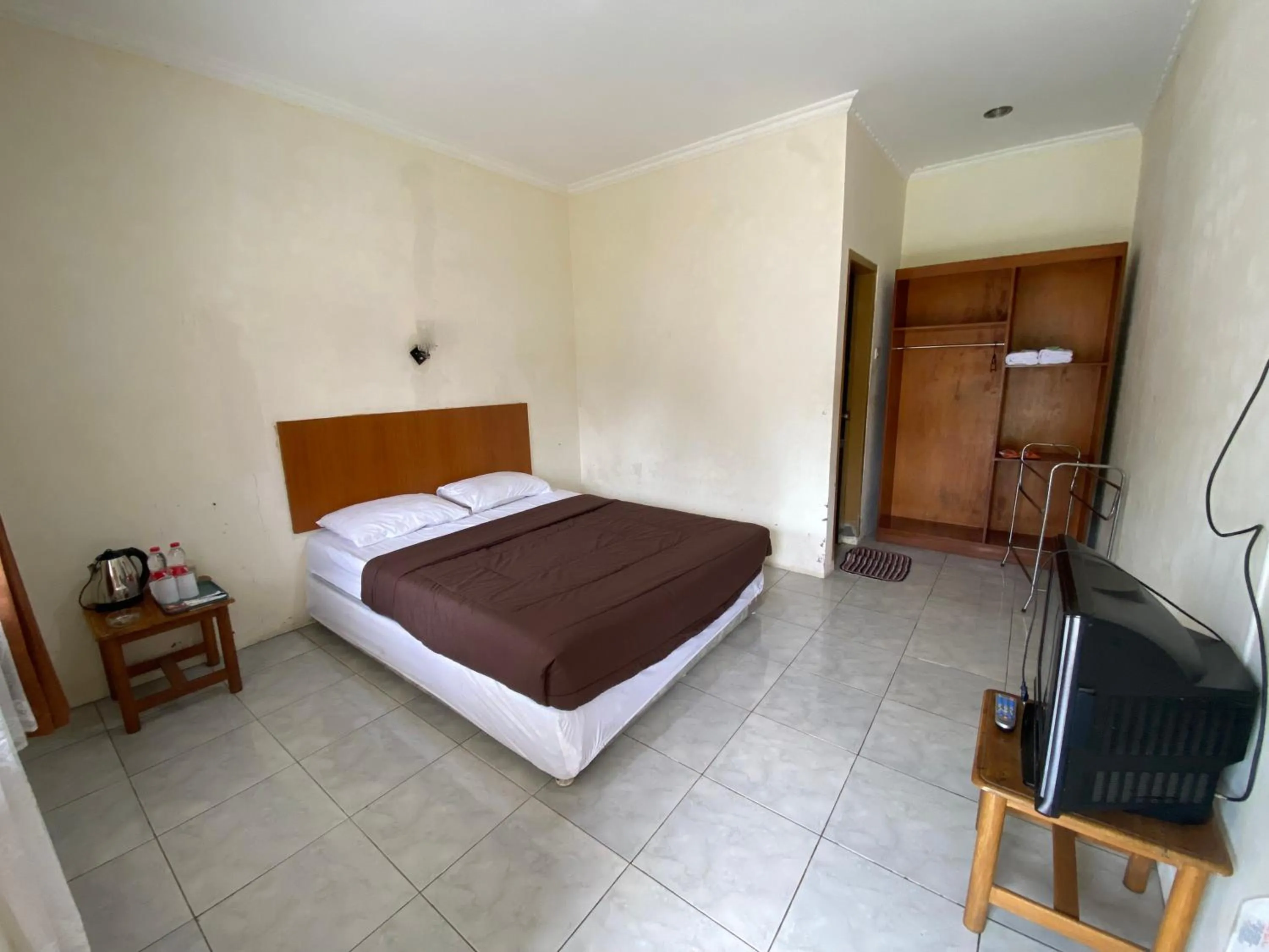 Bed in Hotel Puspa Sari