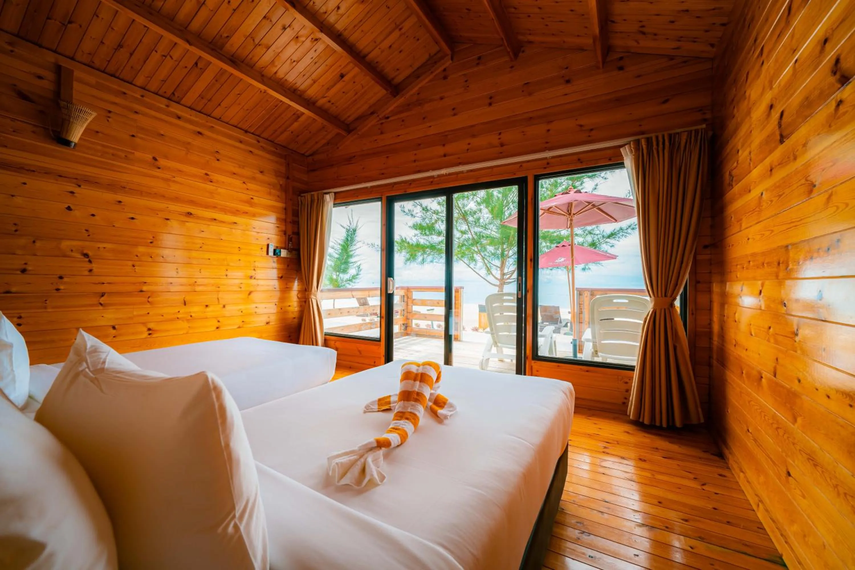 Photo of the whole room, Bed in JSK Mantanani Island Resorts