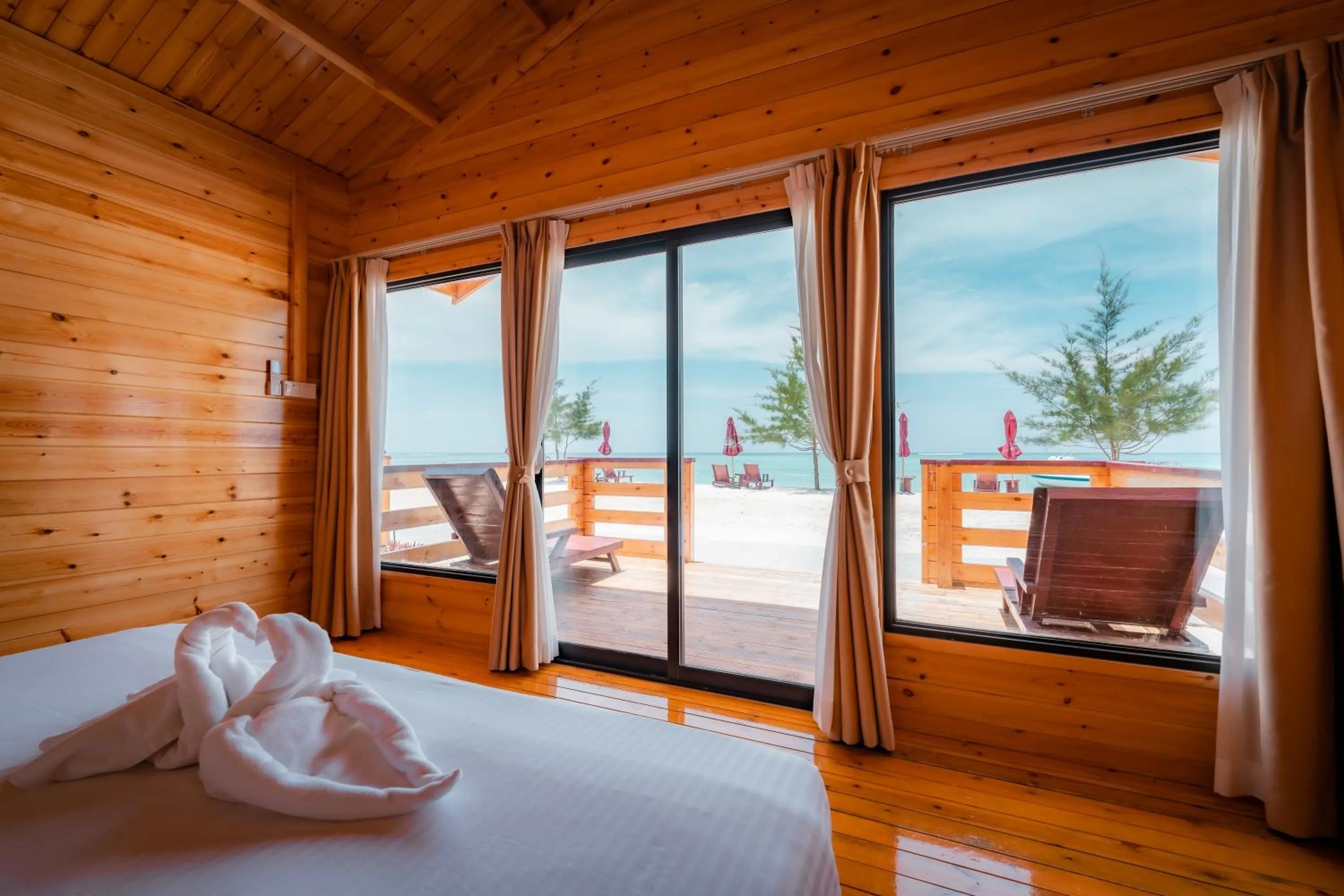 Photo of the whole room, Bed in JSK Mantanani Island Resorts