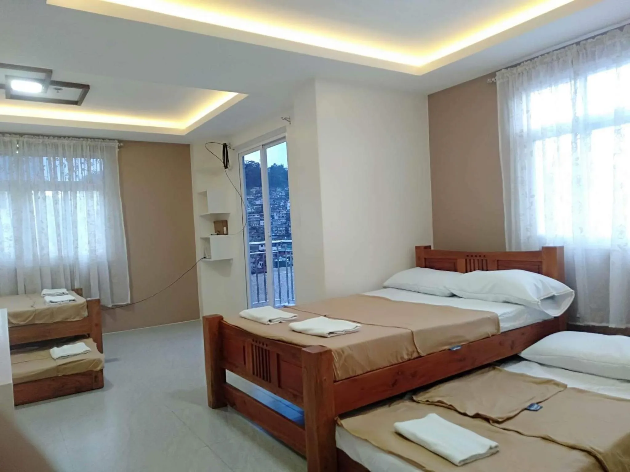 Bed in Visita highland Inn