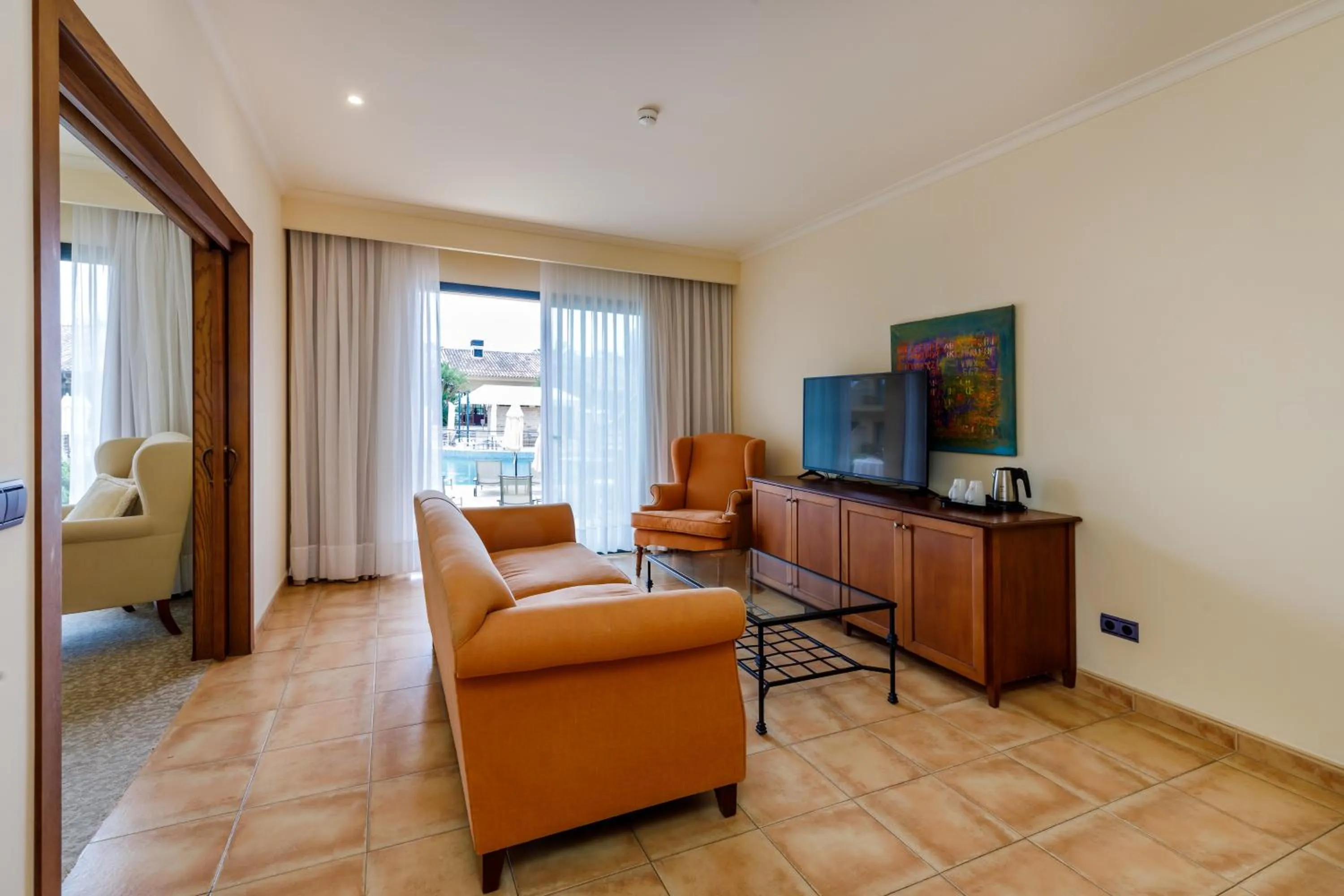 Living room in La Quinta Menorca by PortBlue Boutique - Adults Only