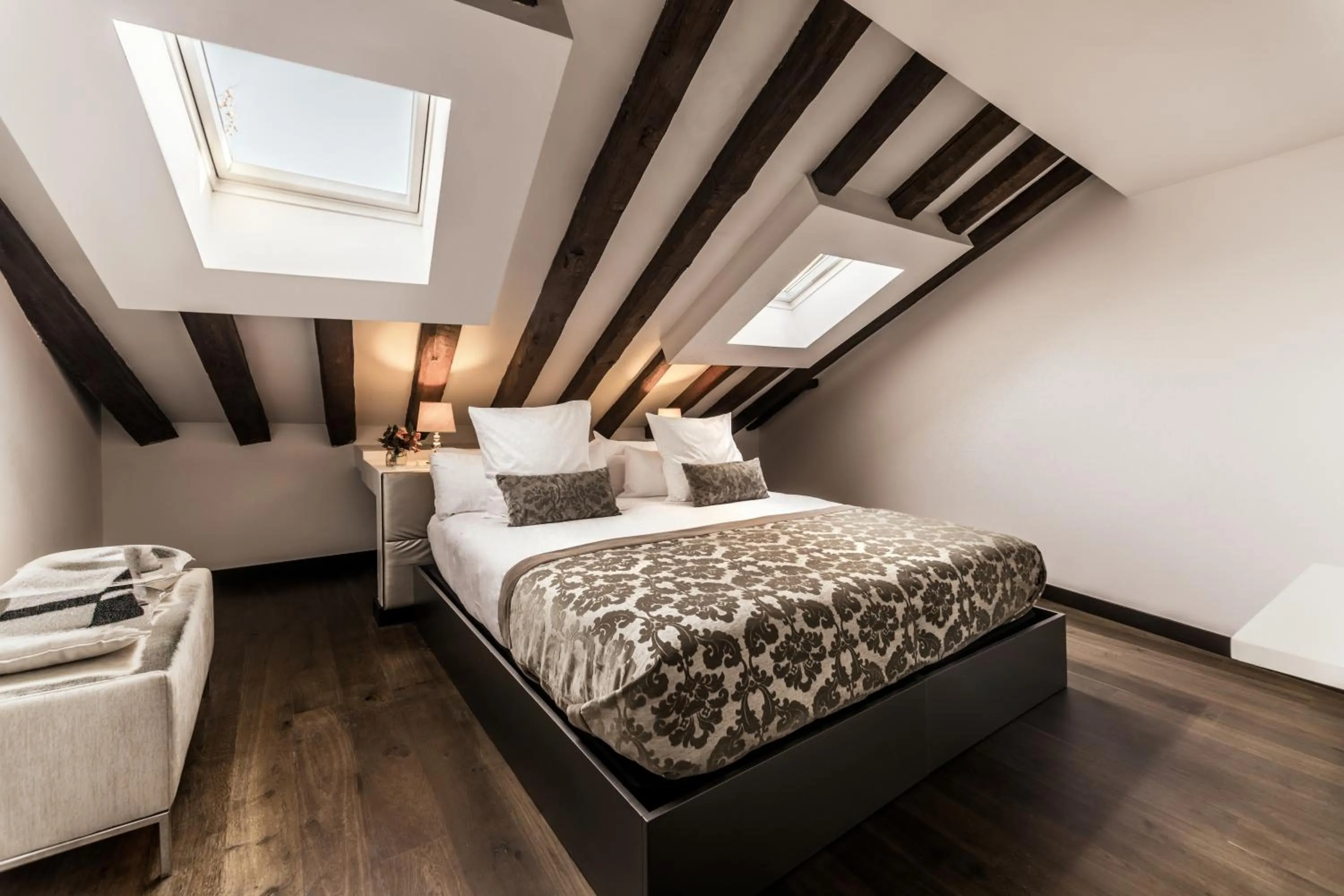 Property building, Bed in Hospes Puerta de Alcalá, a Member of Design Hotels