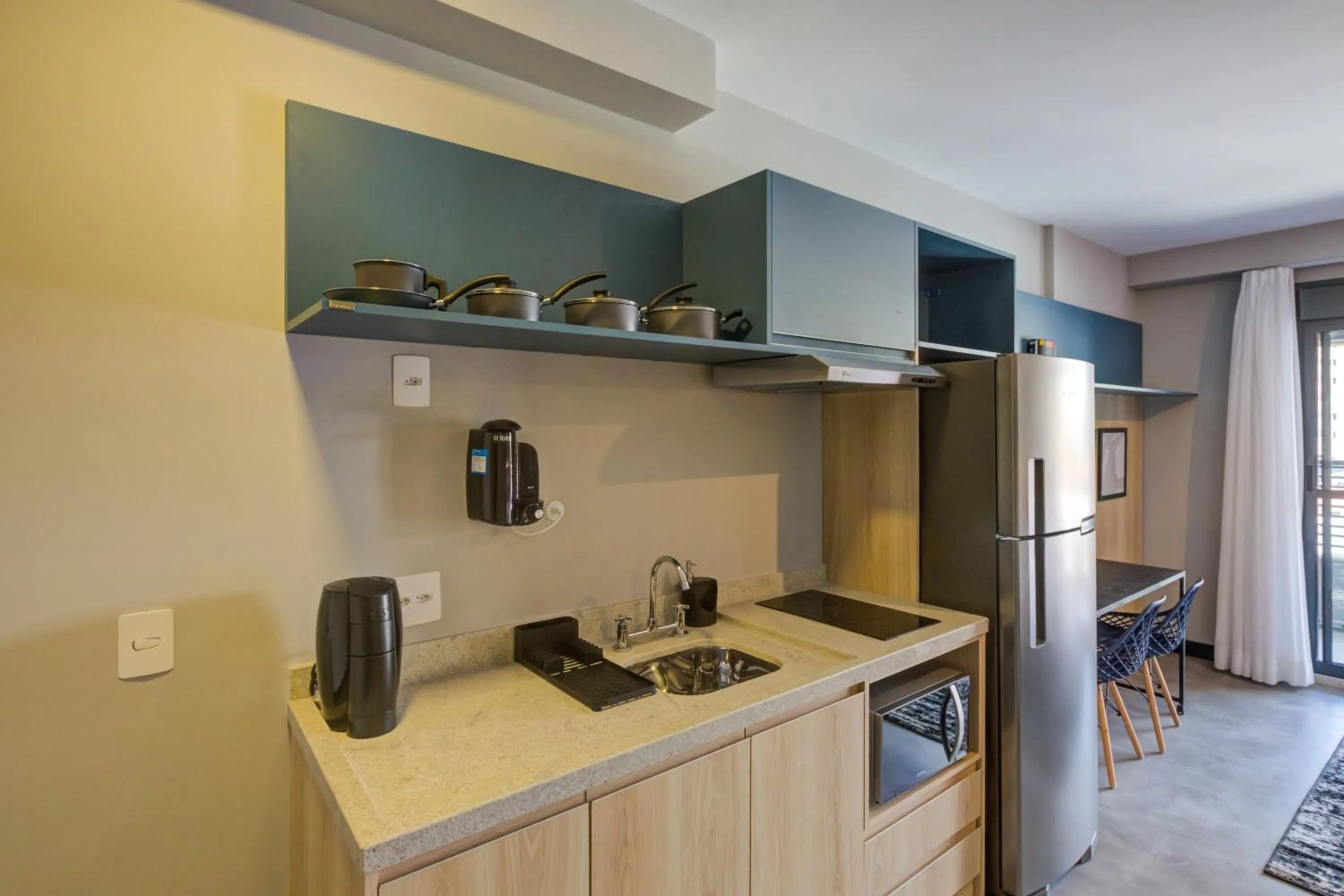 kitchen in Roomo Brooklin Morumbi Residencial