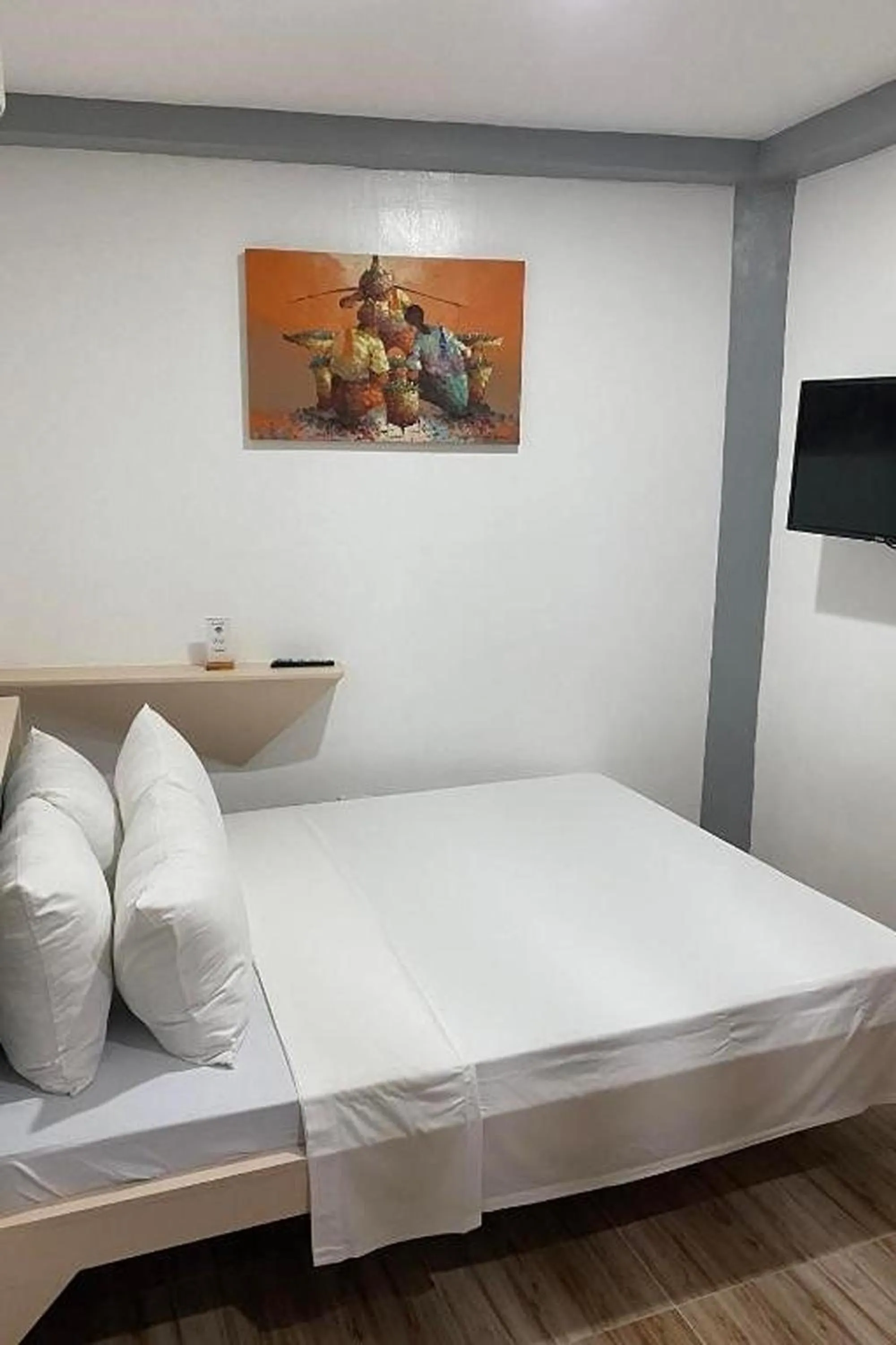 Photo of the whole room, Bed in Woza Inn Boracay