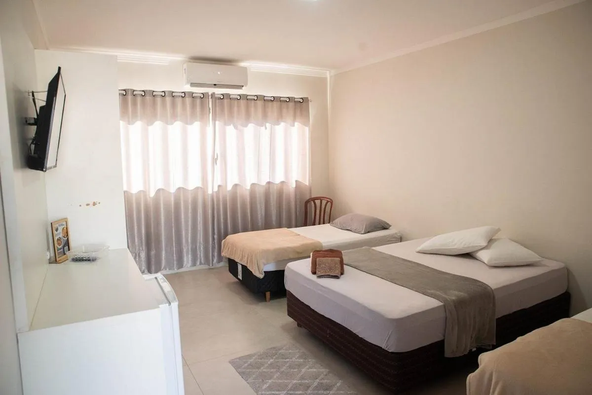 Bed in Pousada Castelo do Rei