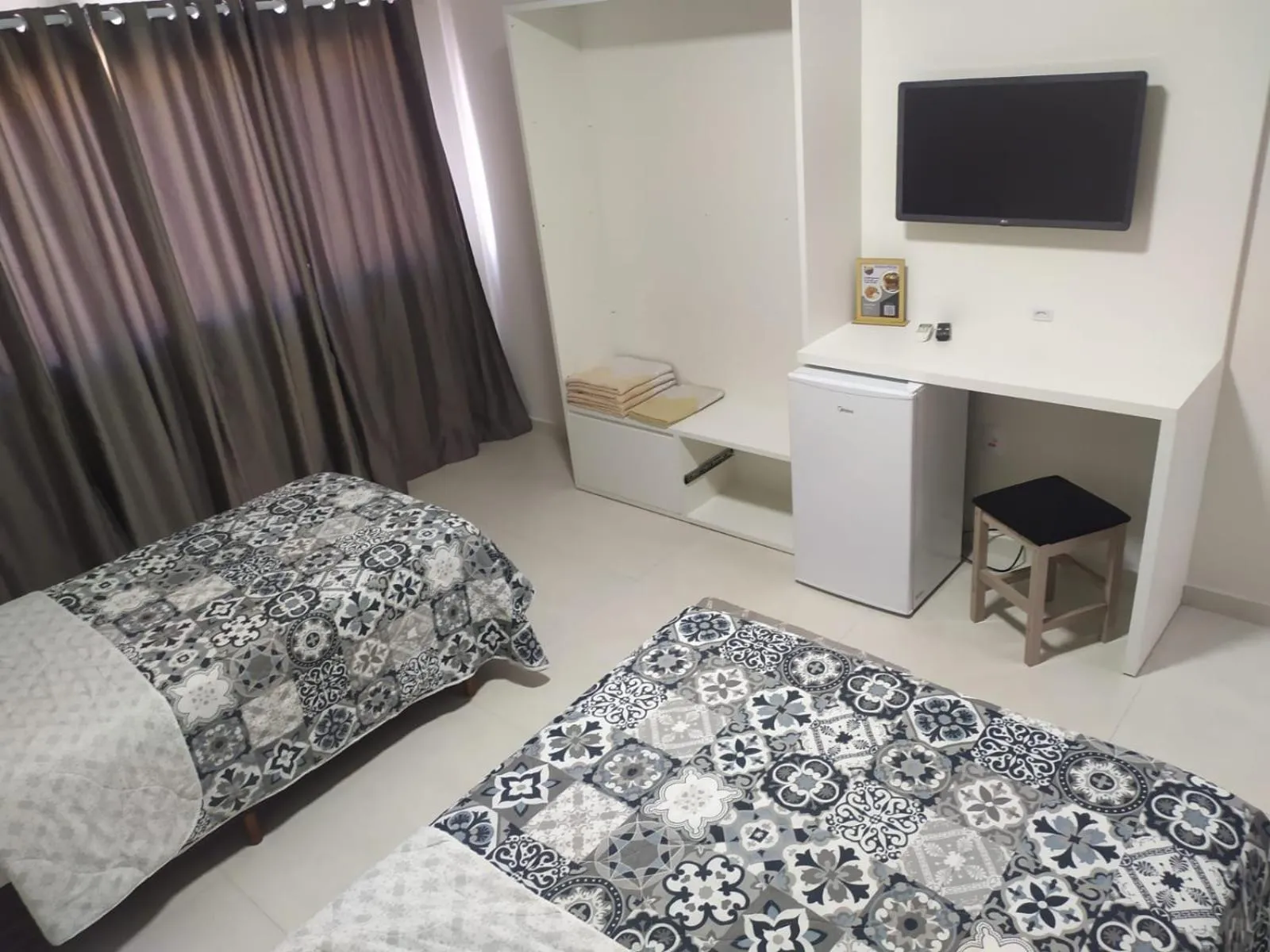 Bed in Pousada Castelo do Rei