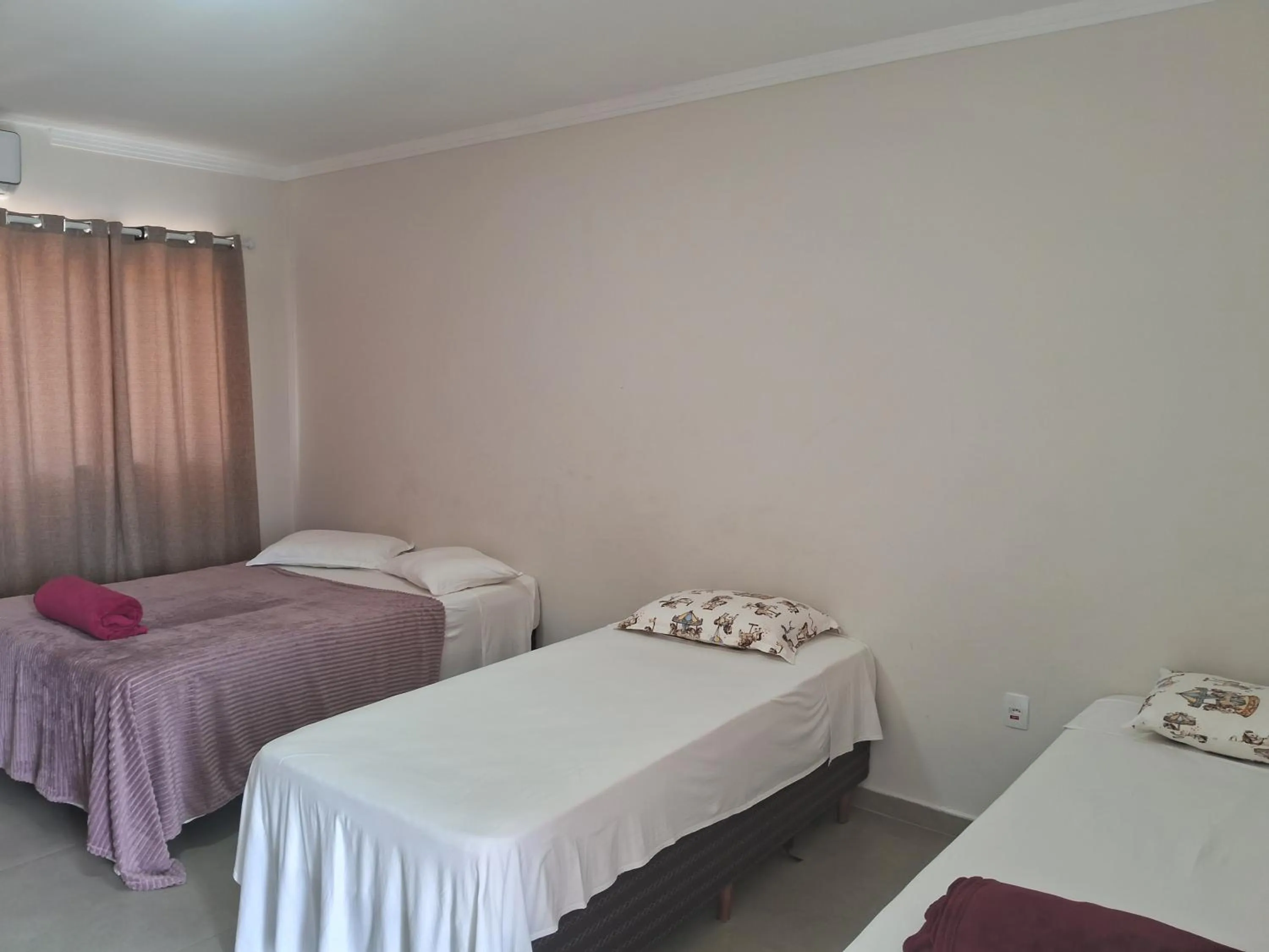 Bed in Pousada Castelo do Rei