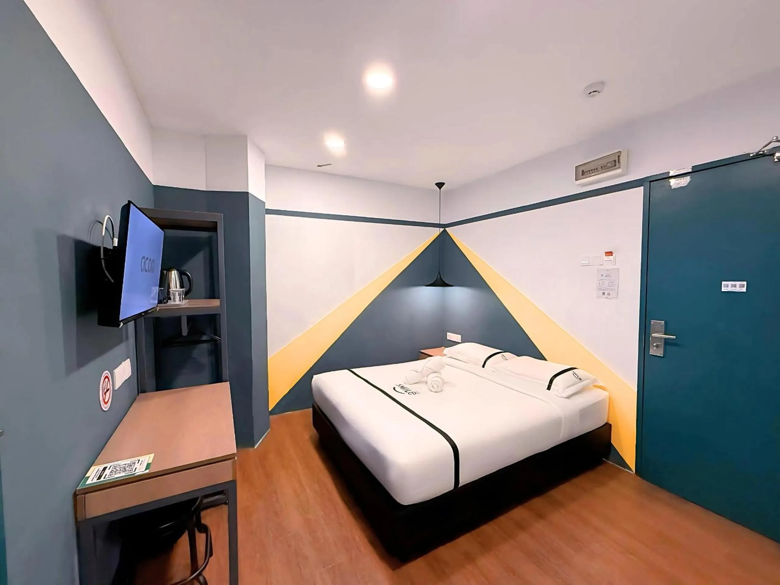 Bed in Smile Hotel Putrajaya
