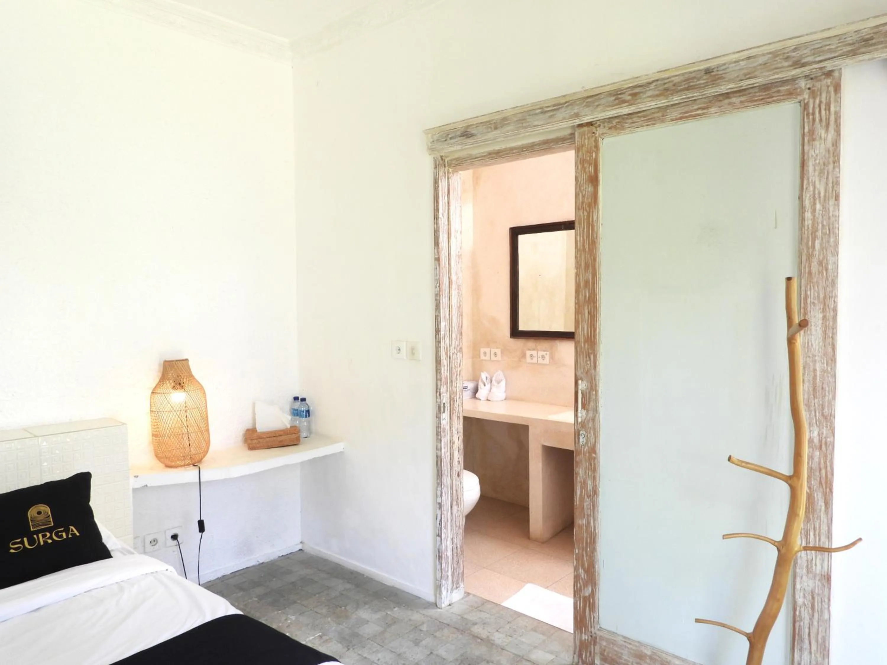 Bathroom, Bed in Surga Homestay