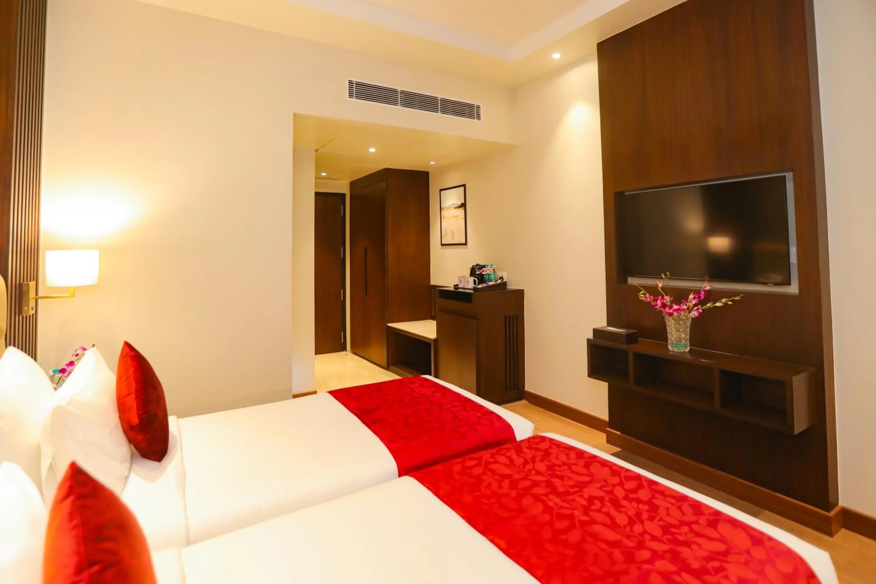 Photo of the whole room, Bed in Regenta Place Jhansi by Royal Orchid Hotels Limited