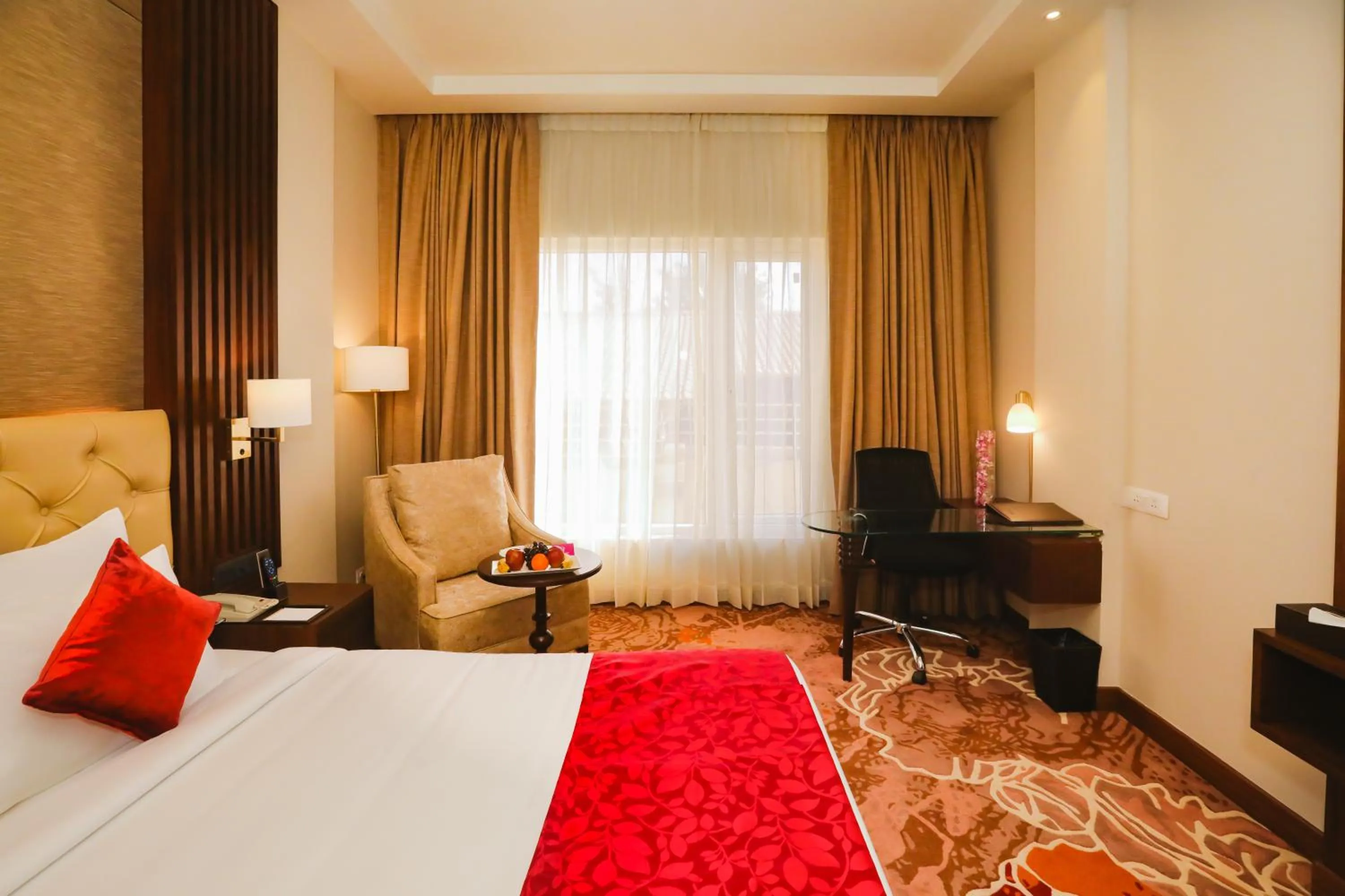 Bedroom, Bed in Regenta Place Jhansi by Royal Orchid Hotels Limited