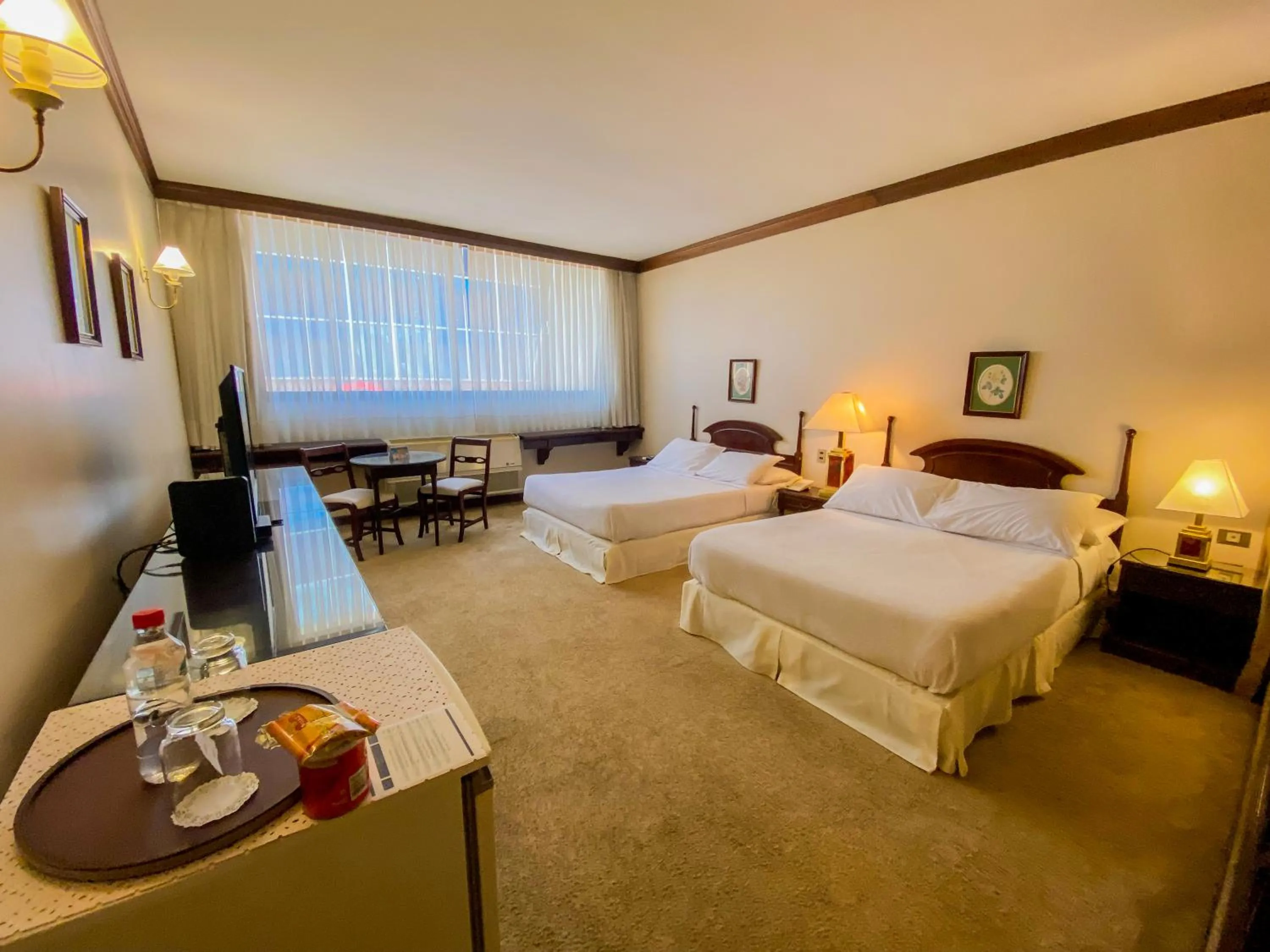 Bed in Nobile Suites Excelsior Asuncion