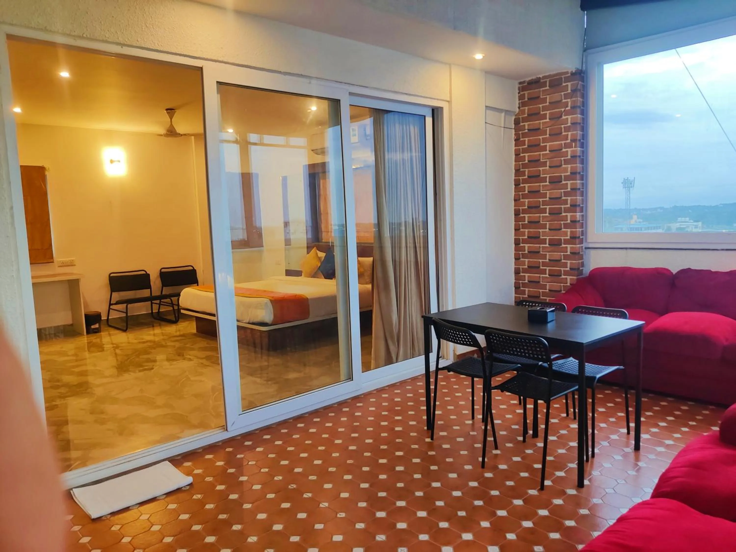 Seating area in Keerthis Royal Suites Hotels in Bangalore Airport