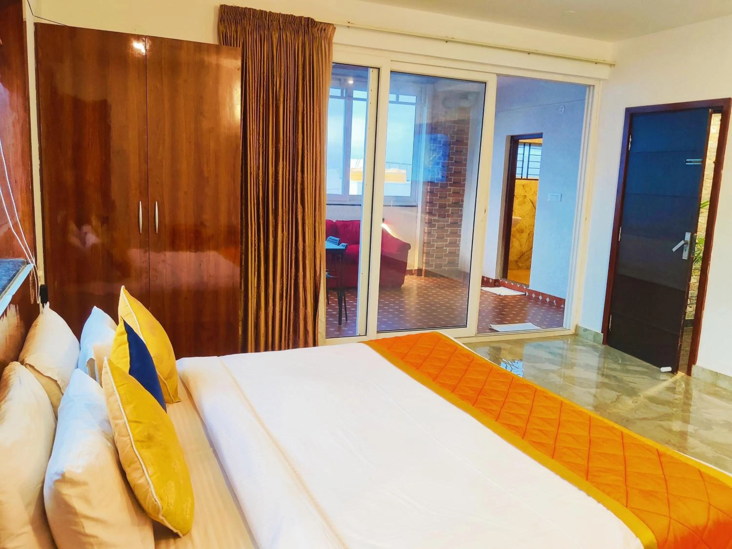 Photo of the whole room, Bed in Keerthis Royal Suites Hotels in Bangalore Airport