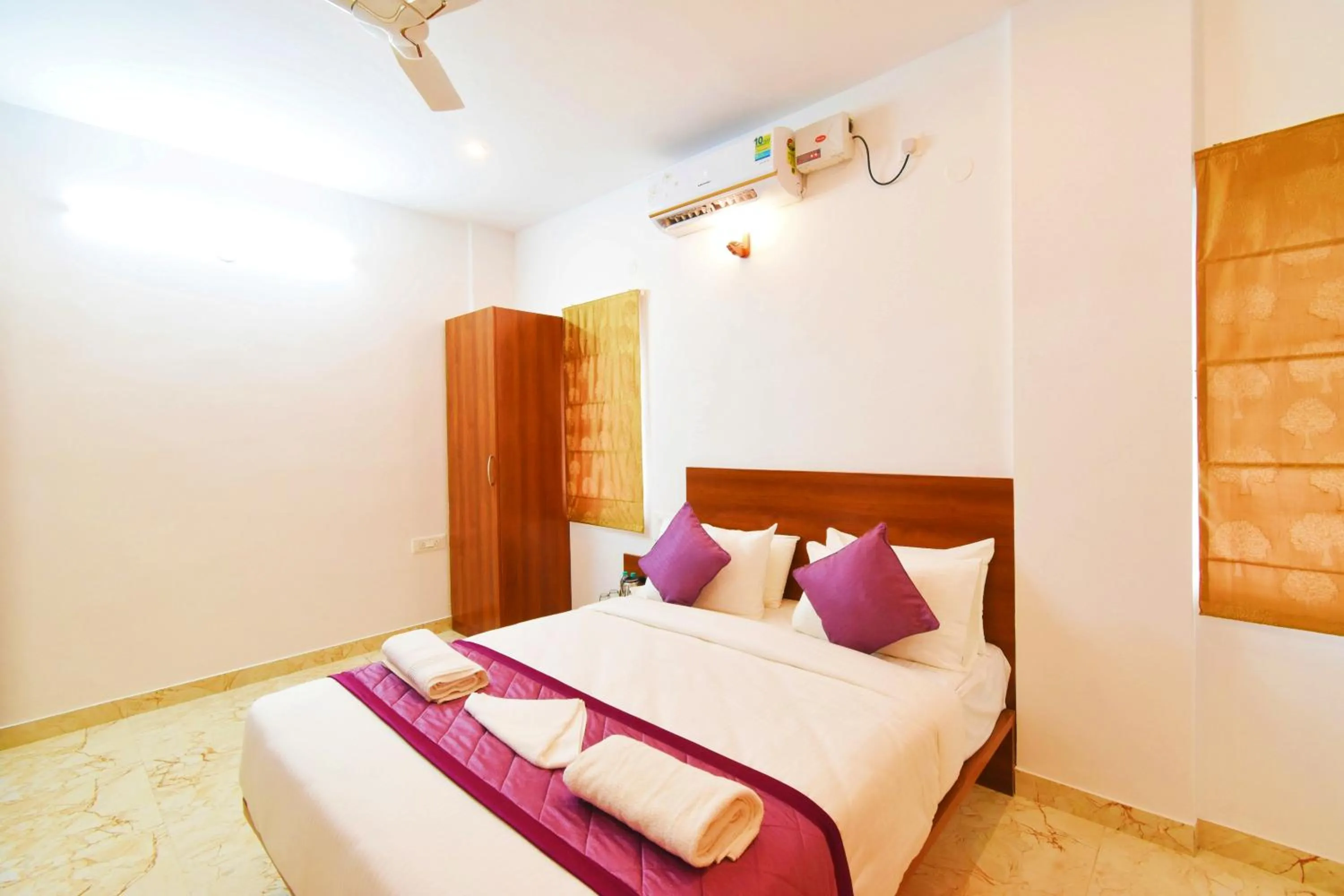 Photo of the whole room, Bed in Keerthis Royal Suites Hotels in Bangalore Airport