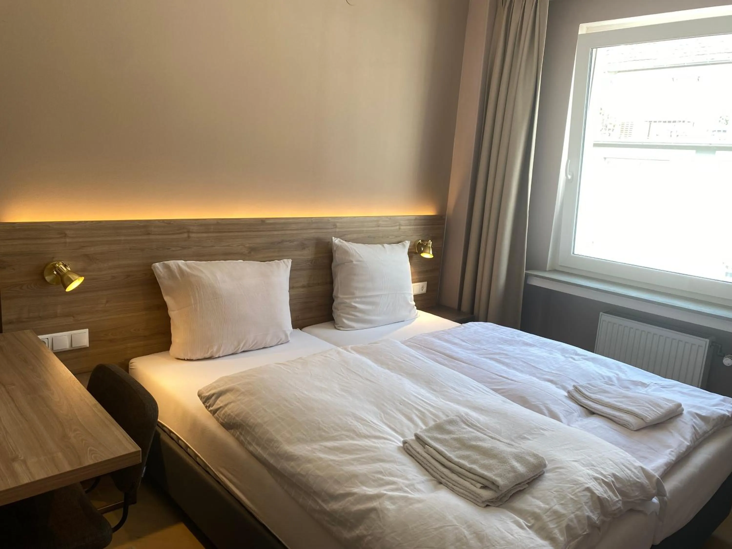 Bed in Hotel Petite Königsallee SELF CHECK-IN