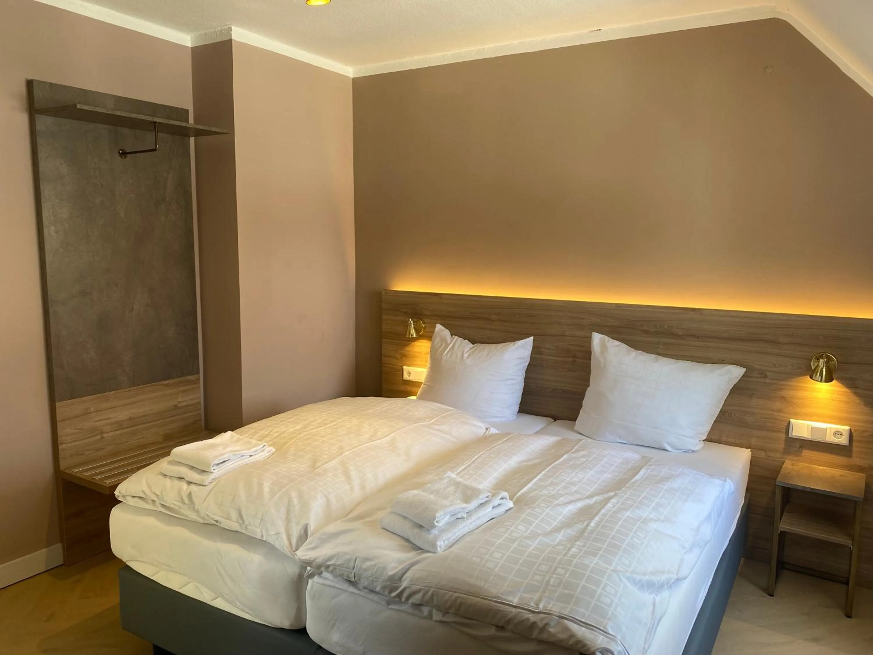 Bed in Hotel Petite Königsallee SELF CHECK-IN