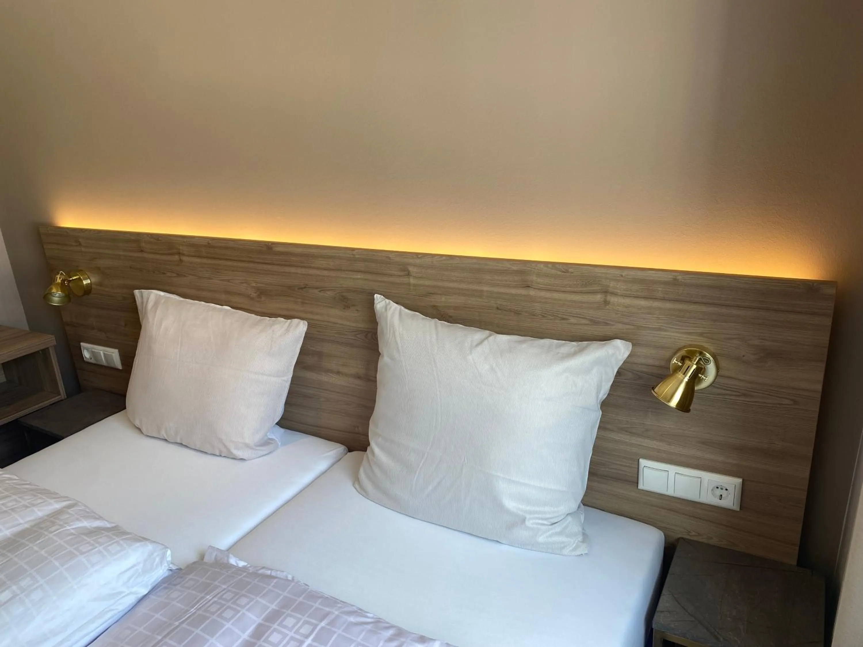 Bed in Hotel Petite Königsallee SELF CHECK-IN