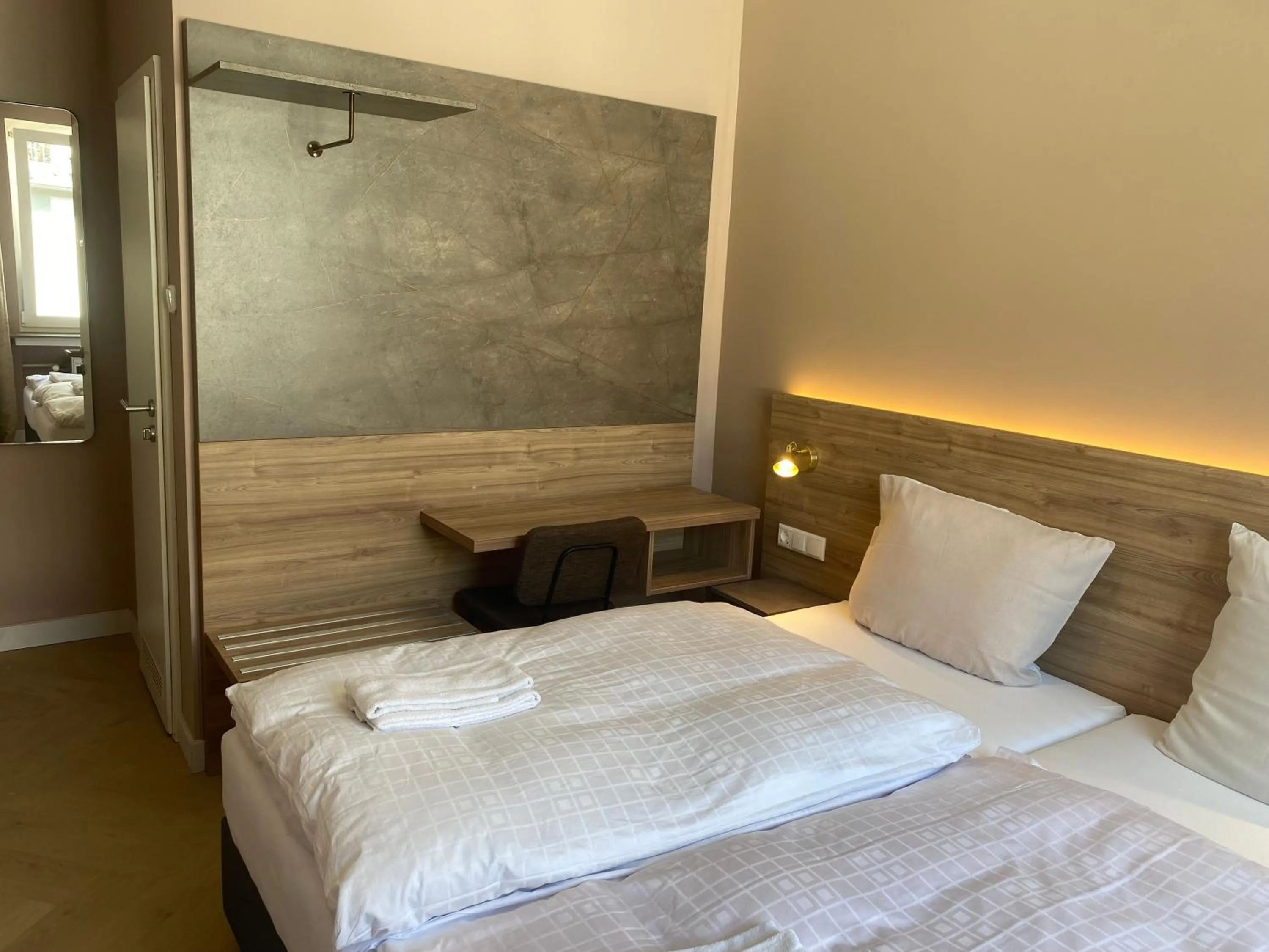 Bed in Hotel Petite Königsallee SELF CHECK-IN