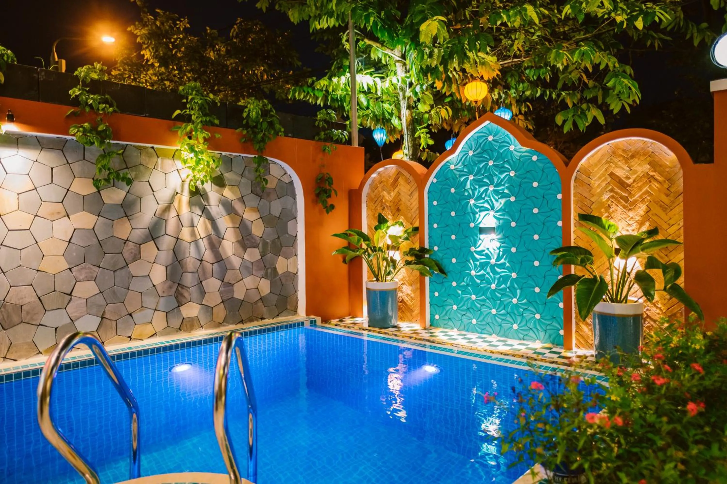 Swimming pool in De'Colore Villa Hoi An