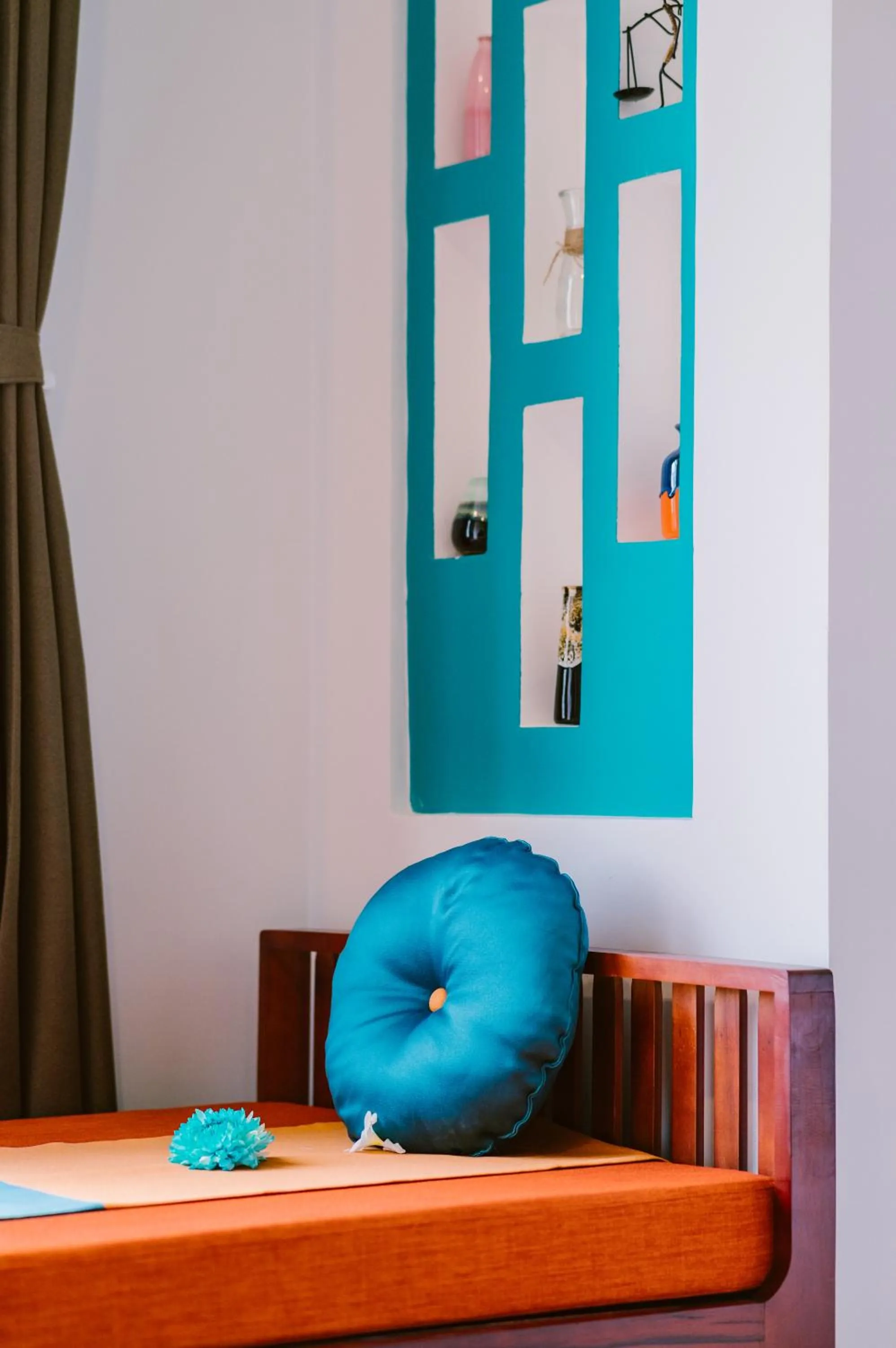 Seating area, Bed in De'Colore Villa Hoi An