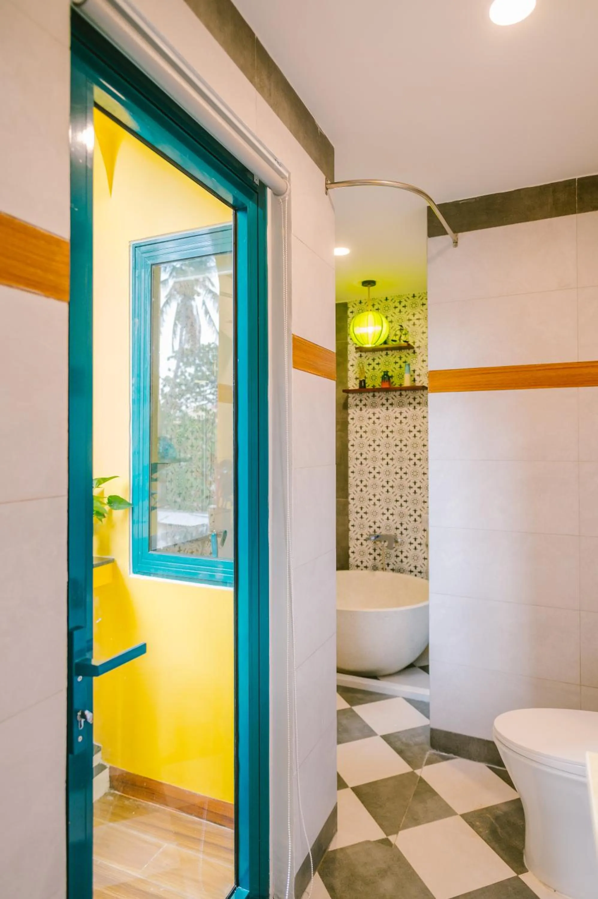 Bathroom in De'Colore Villa Hoi An