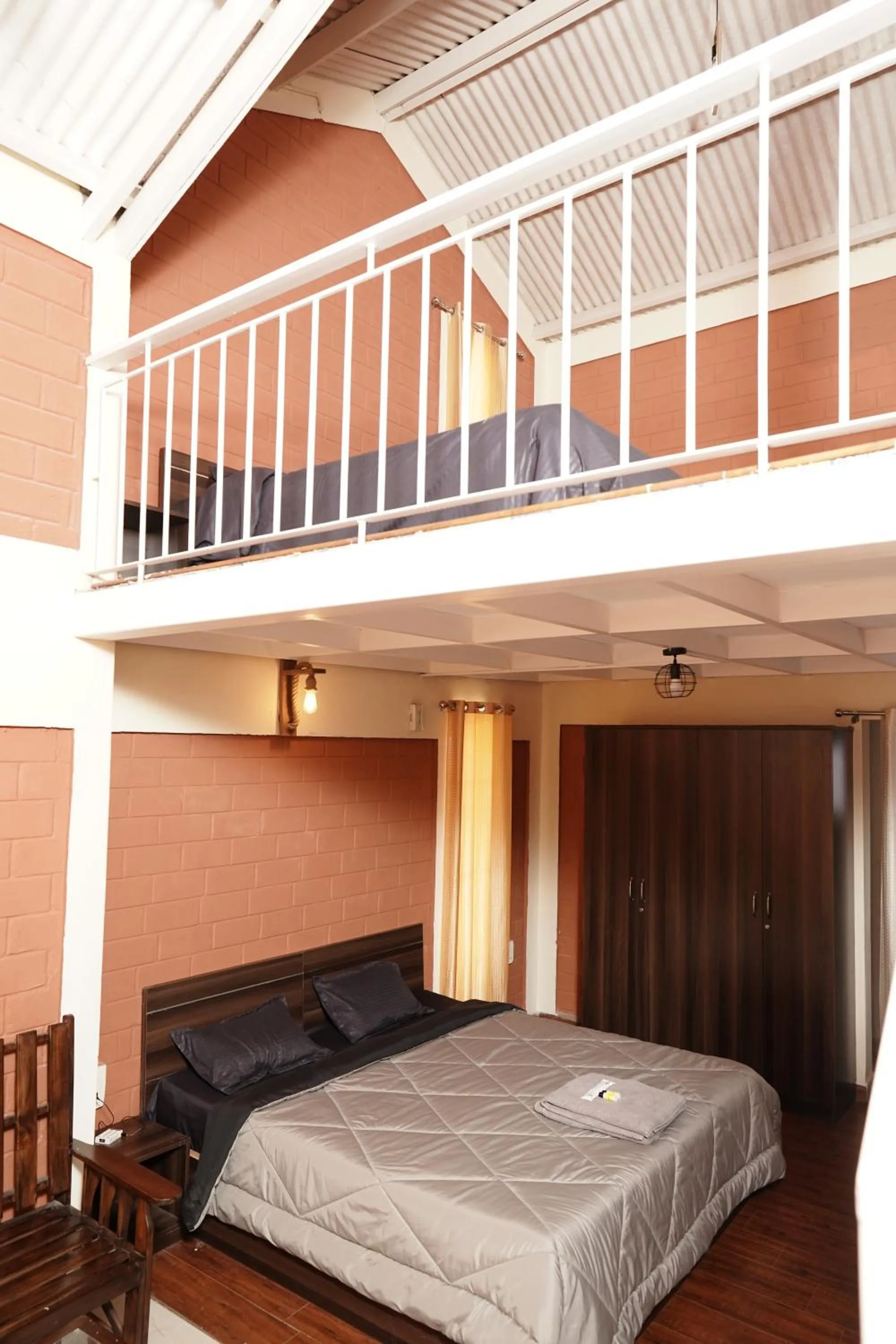 Bed in Tea Leaf Stays by Brown Tree Resorts