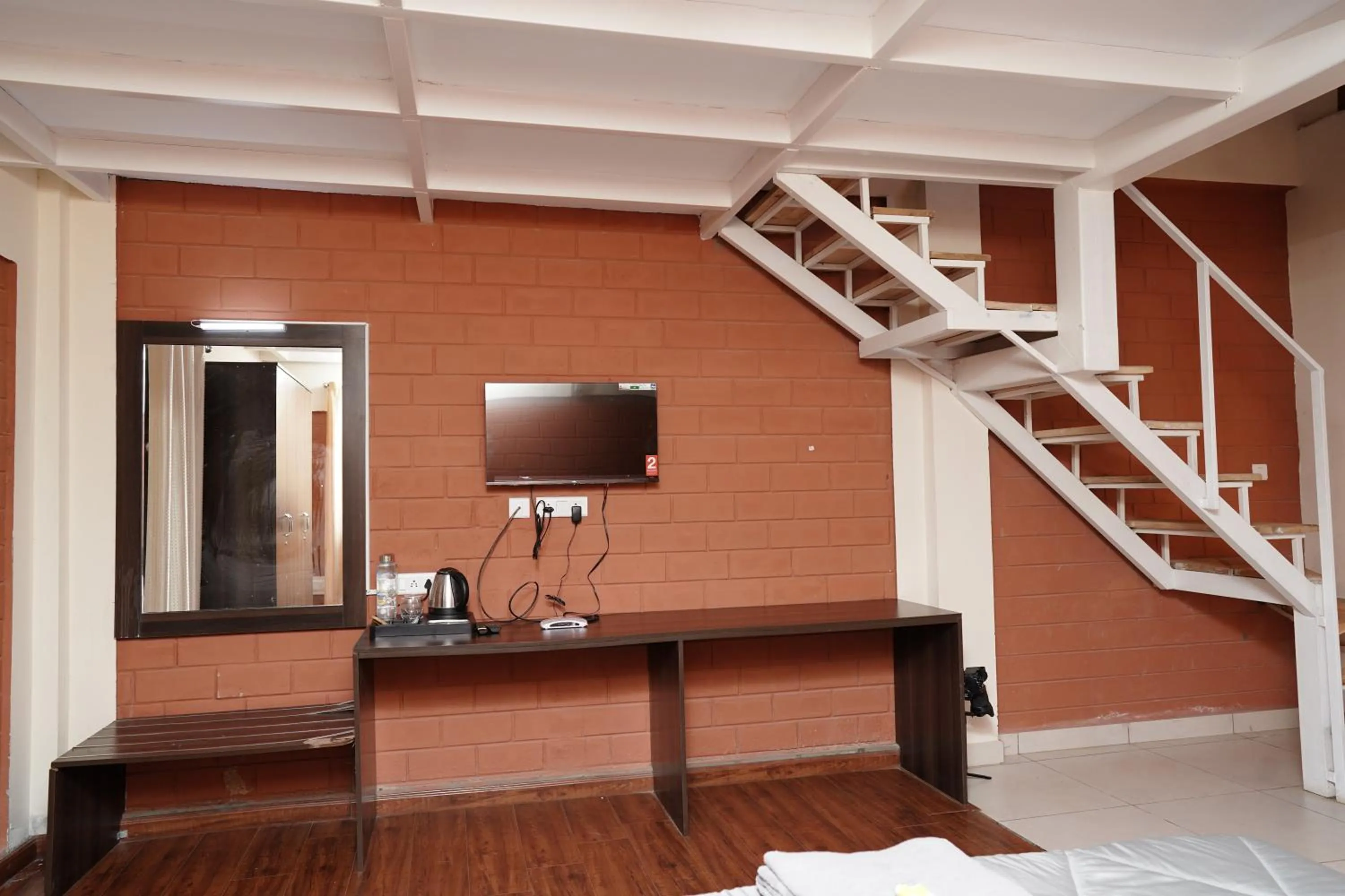 Bed in Tea Leaf Stays by Brown Tree Resorts