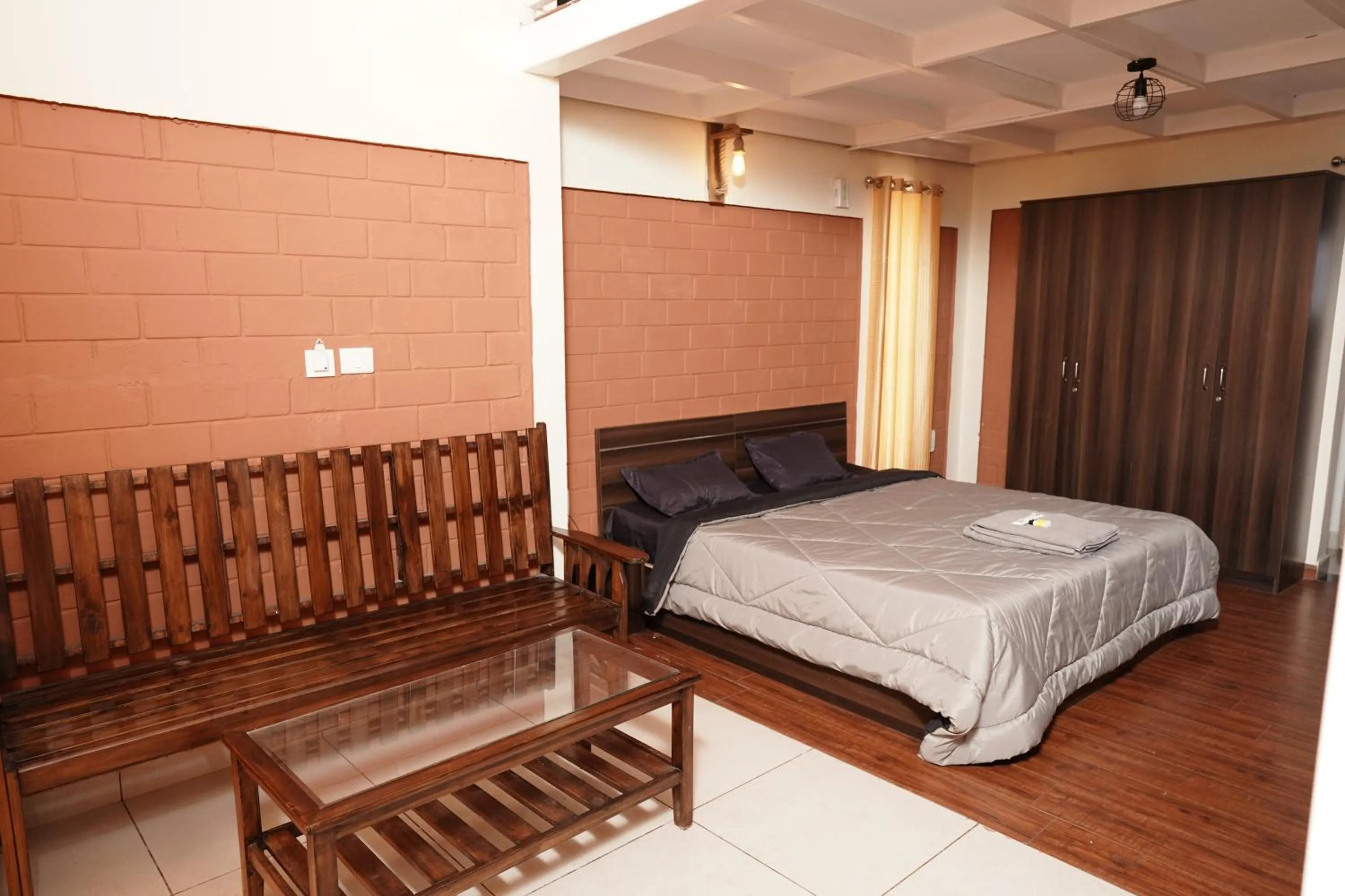 Bed in Tea Leaf Stays by Brown Tree Resorts