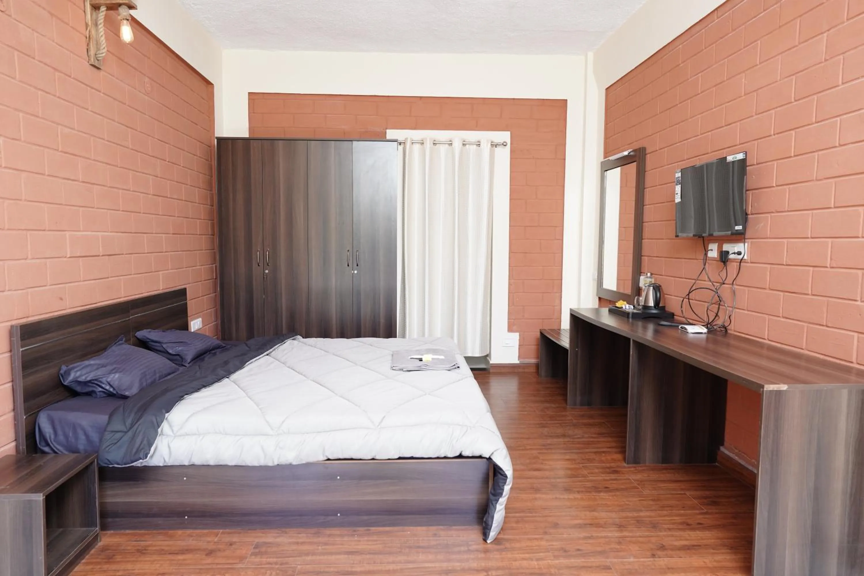 Bed in Tea Leaf Stays by Brown Tree Resorts