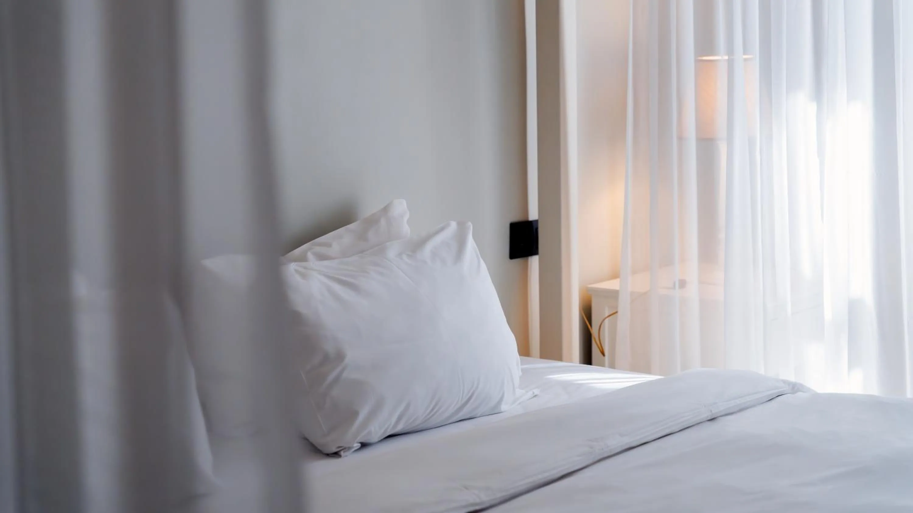 Bed in DeCamondo Residence