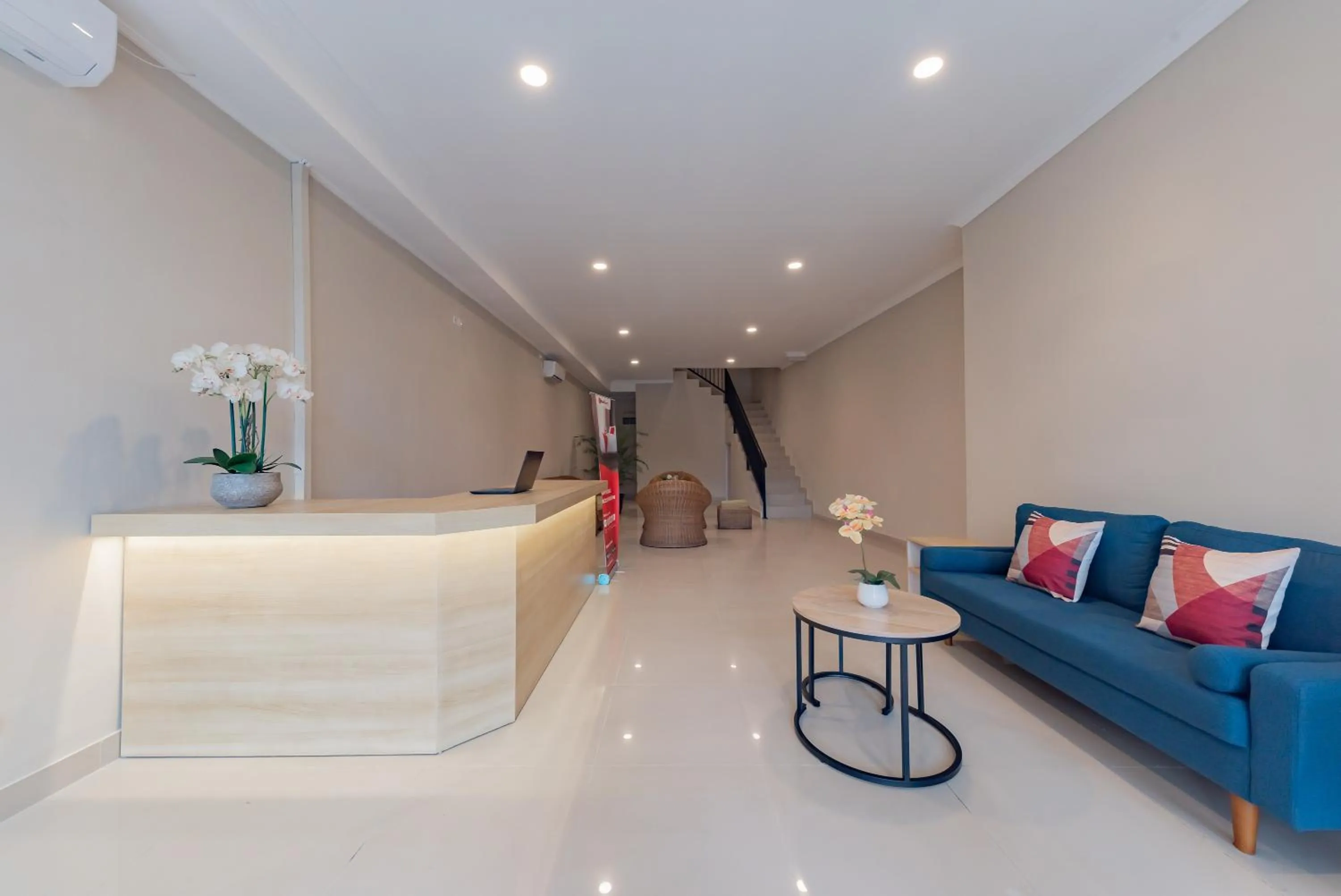 Living room in RedDoorz Plus near Surapati Core