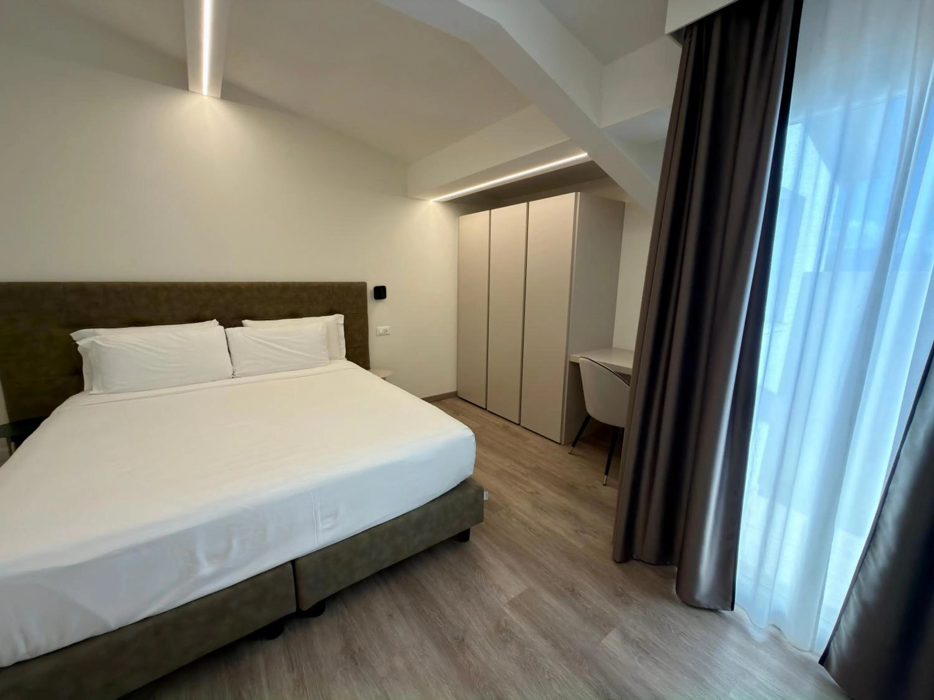 Bedroom, Bed in Vi Suites