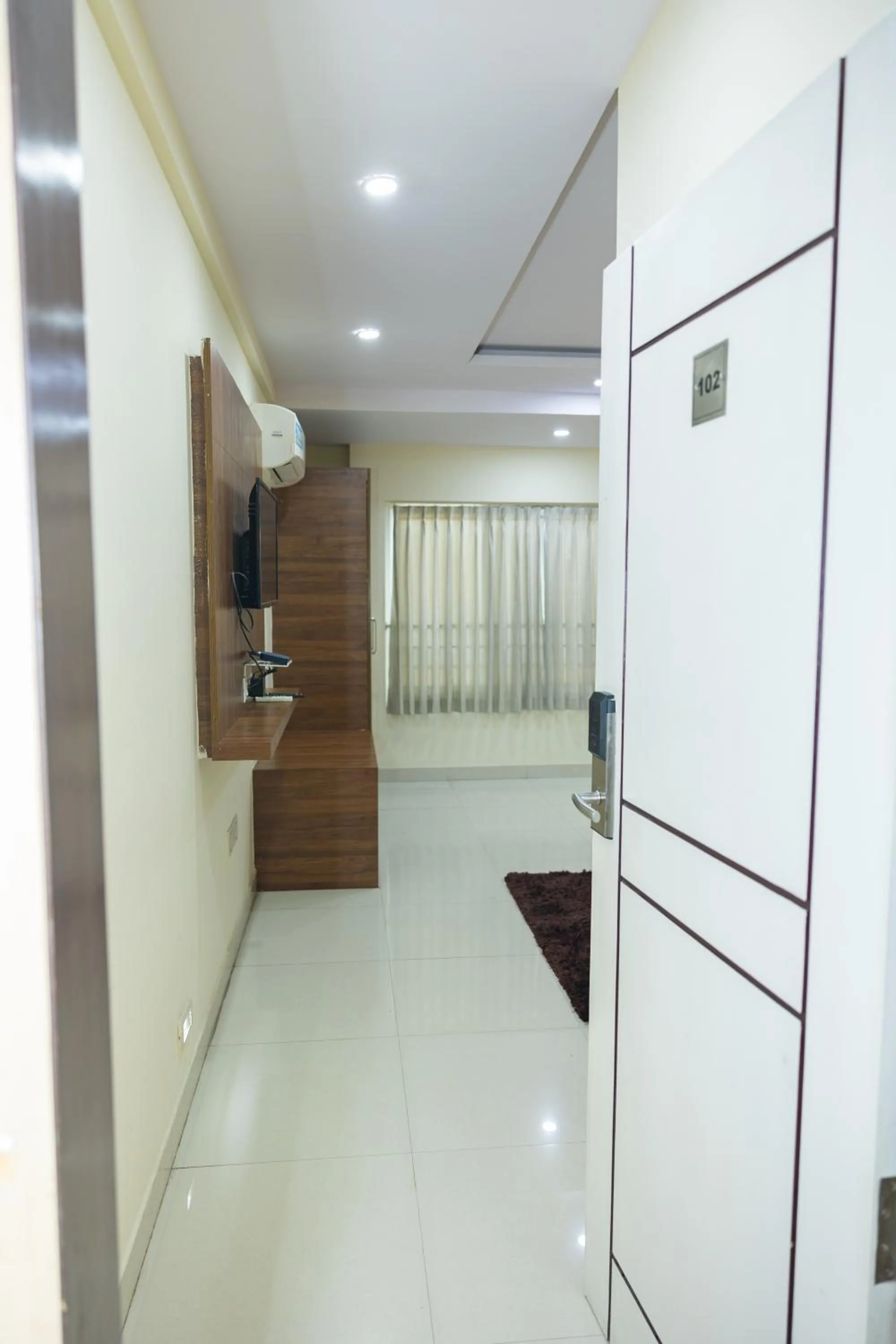 Bedroom in Ishwerya Suites